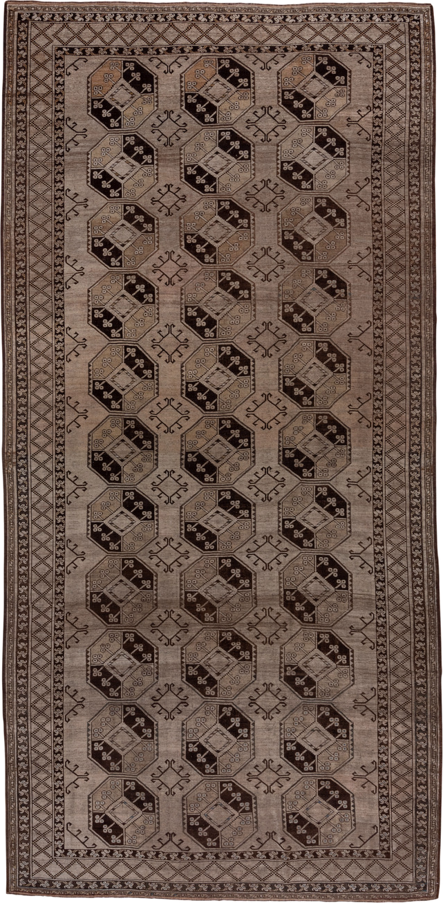 7' x 15' one-of-a-kind handmade antique Afghan rug. Color palette: taupe, brown, camel, ivory, charcoal, beige, gray, black