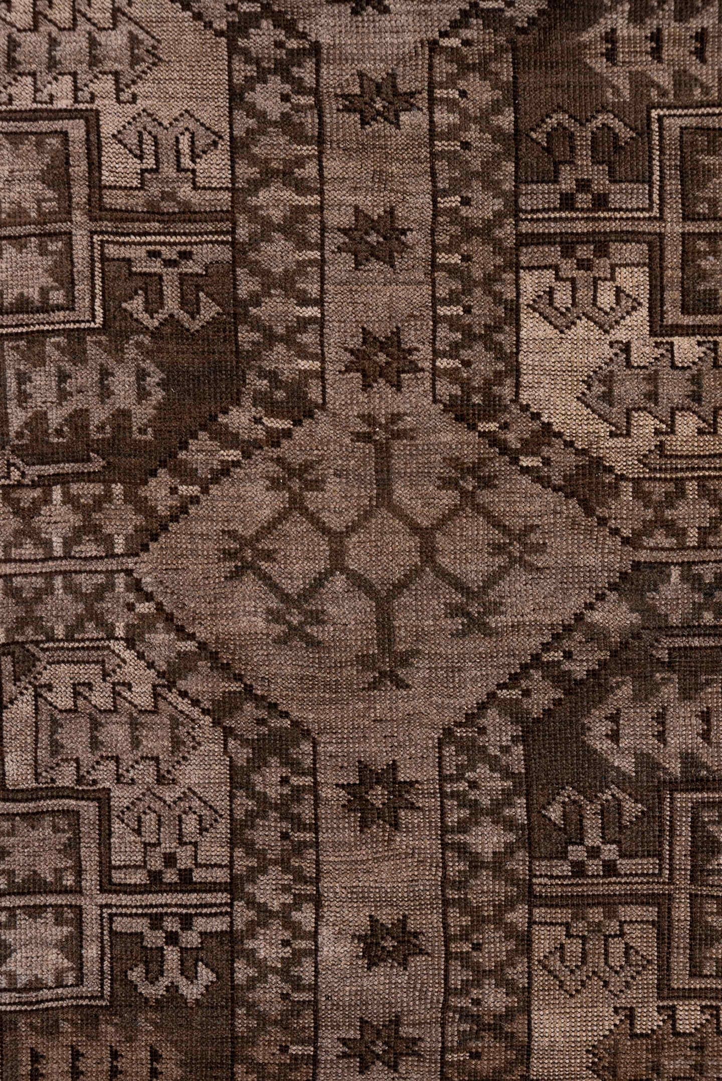 6' x 9' one-of-a-kind handmade antique Afghan medium size rug. Color palette: taupe, brown, charcoal, camel, ivory, beige