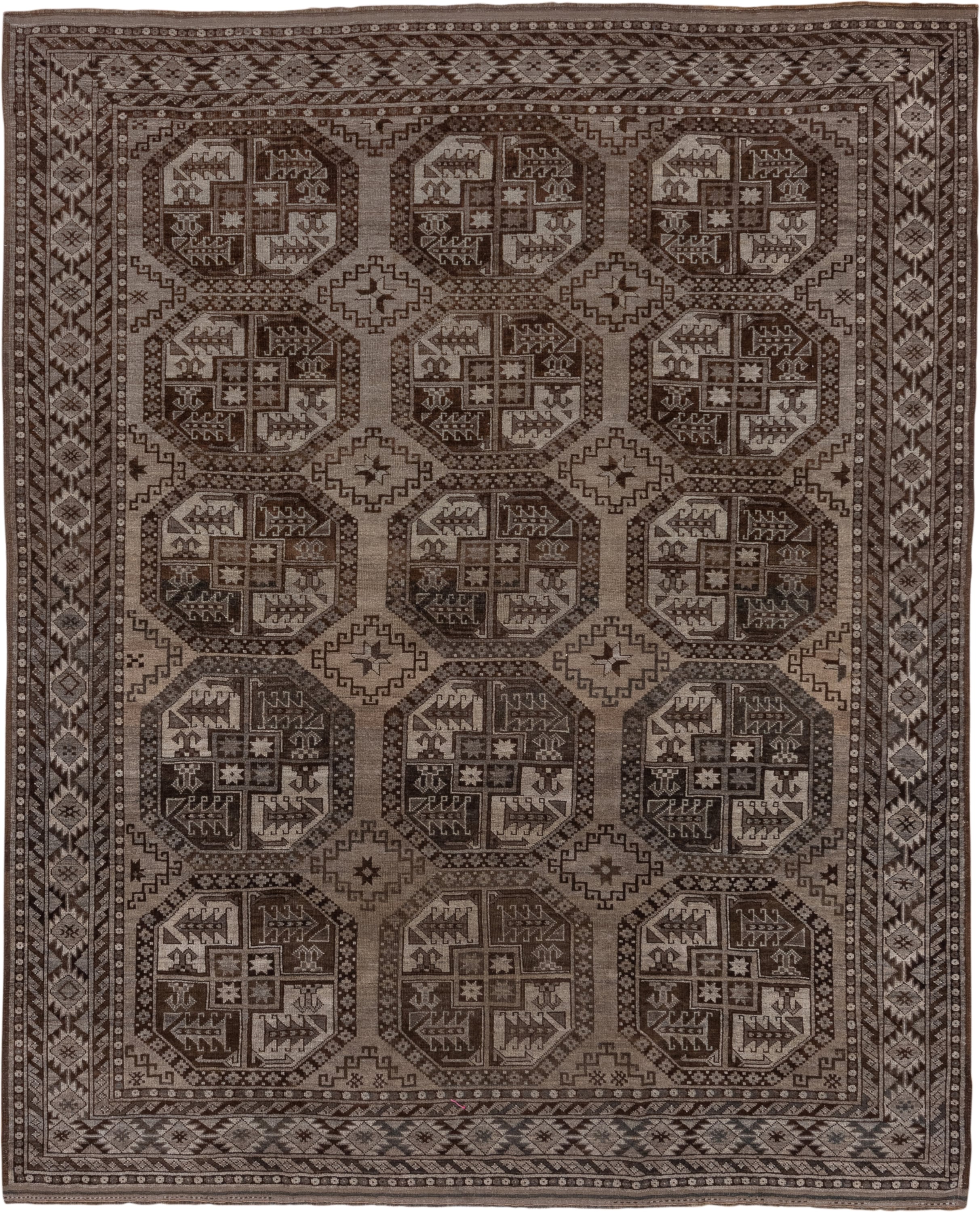 7' x 9' one-of-a-kind handmade antique Afghan rug. Color palette: brown, taupe, ivory, charcoal, camel, slate, beige, gray