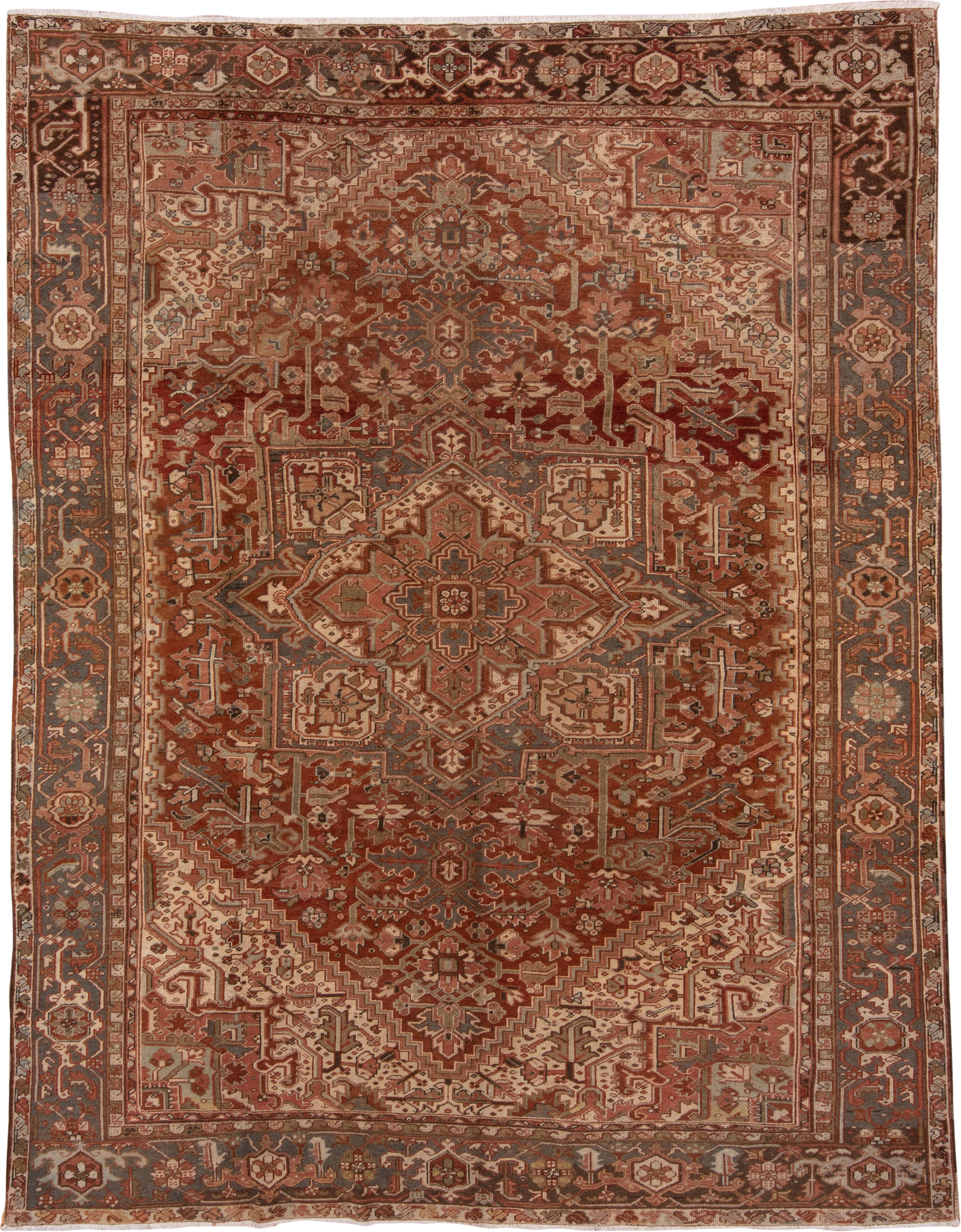 9' x 12' one-of-a-kind handmade vintage Heriz large size rug. Color palette: rust, terracotta, ivory, slate, taupe, brown