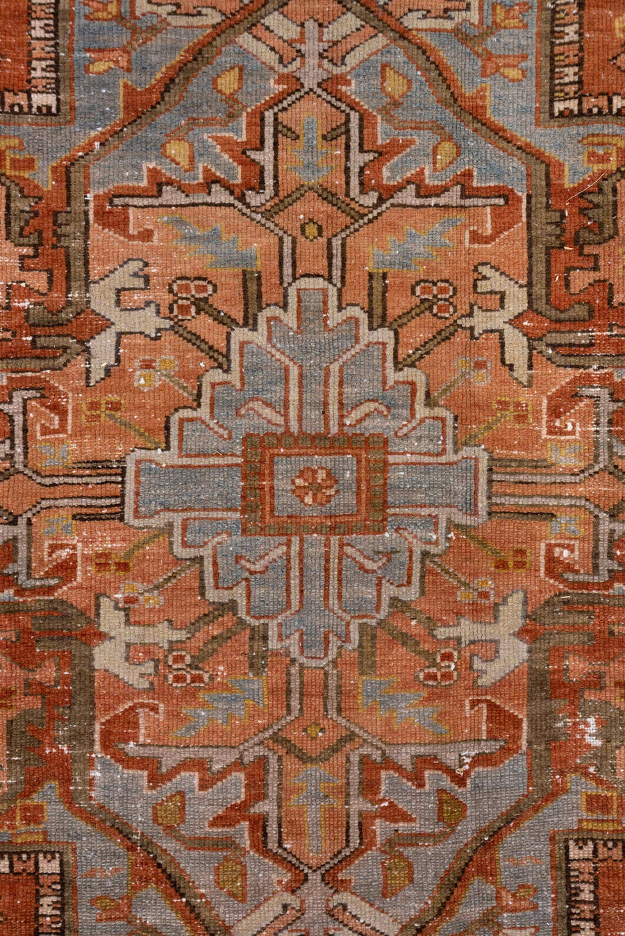 8' x 10' one-of-a-kind handmade antique Serapi large size rug. Color palette: terra cotta, light blue, ivory, rust, taupe