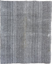 7' x 9' one-of-a-kind handmade antique Flatweave rug. Color palette: gray, charcoal, ivory, black