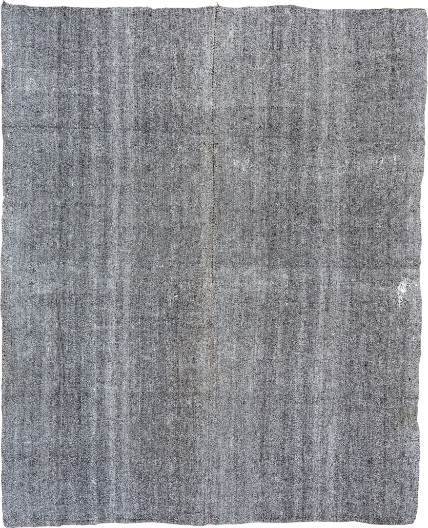7' x 9' one-of-a-kind handmade antique Flatweave rug. Color palette: gray, charcoal, ivory, black