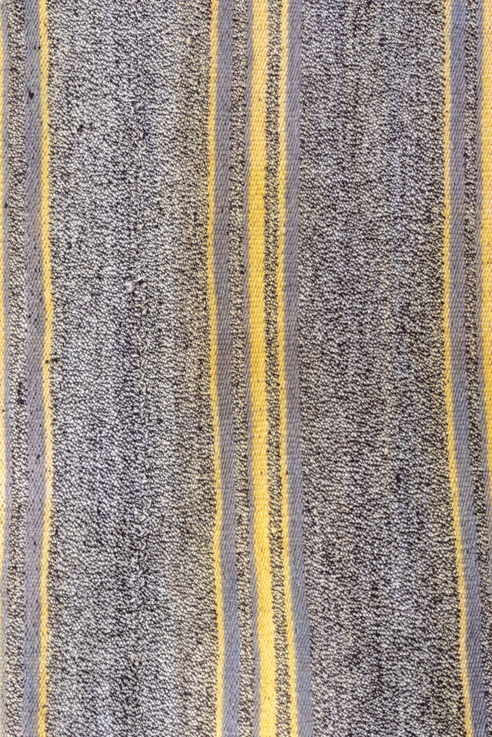 7' x 9' one-of-a-kind handmade antique Flatweave rug. Color palette: gray, ivory, gold, charcoal, black