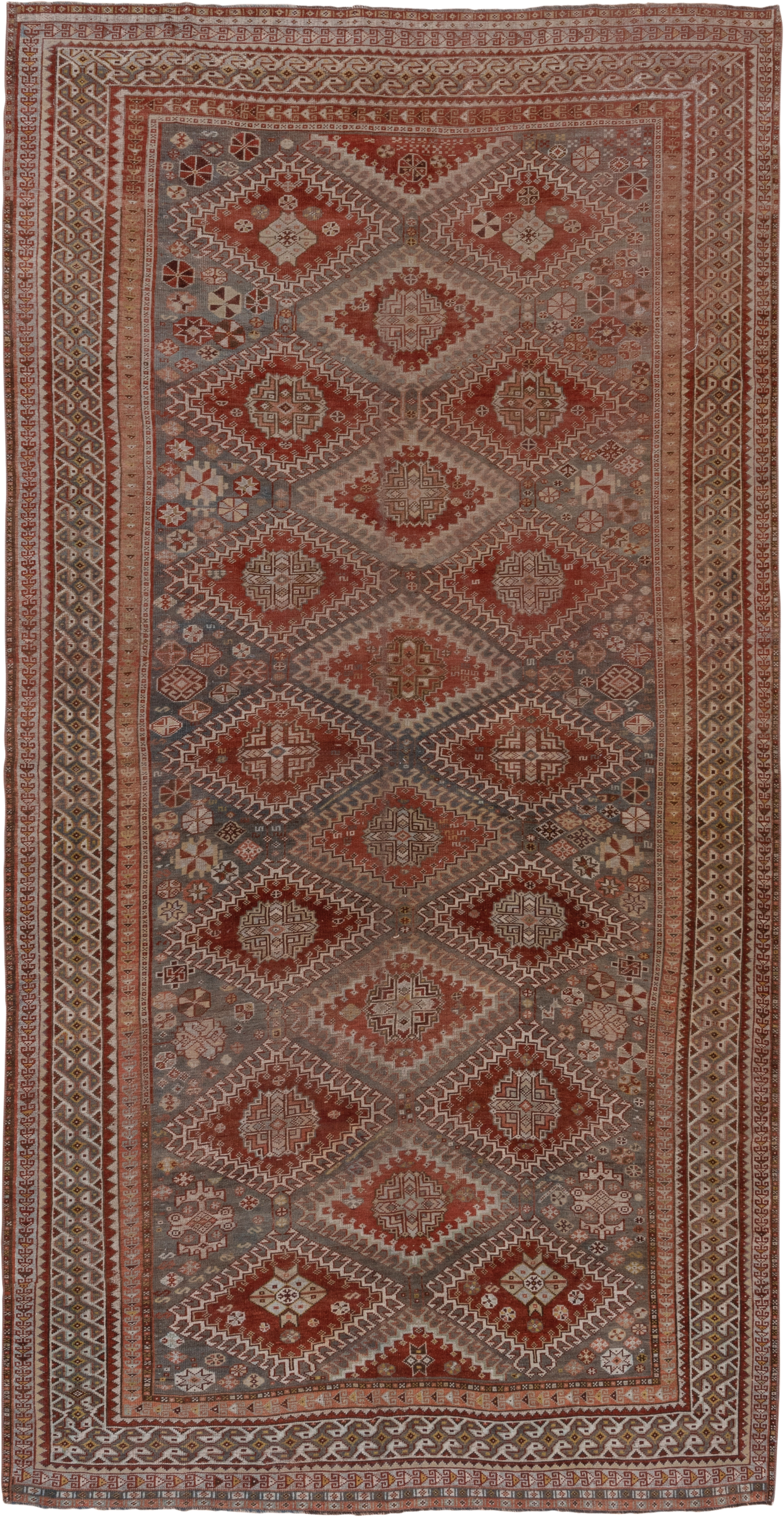 6' x 12' one-of-a-kind handmade antique Shiraz large size rug. Color palette: rust, blue_gray, ivory, taupe, terra_cotta