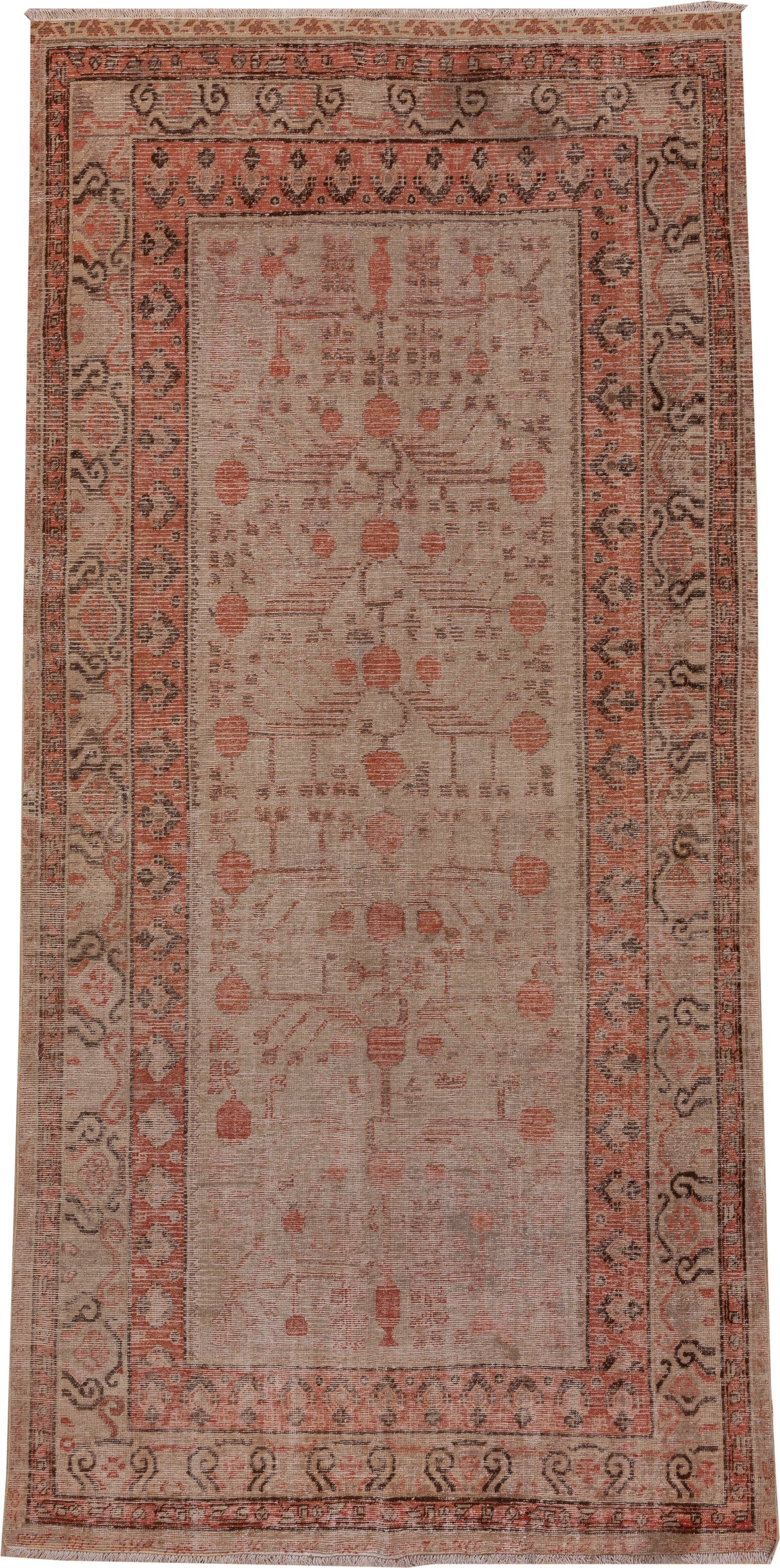 5' x 11' one-of-a-kind handmade antique Khotan rug. Color palette: ivory, terra cotta, taupe, charcoal, rose, camel