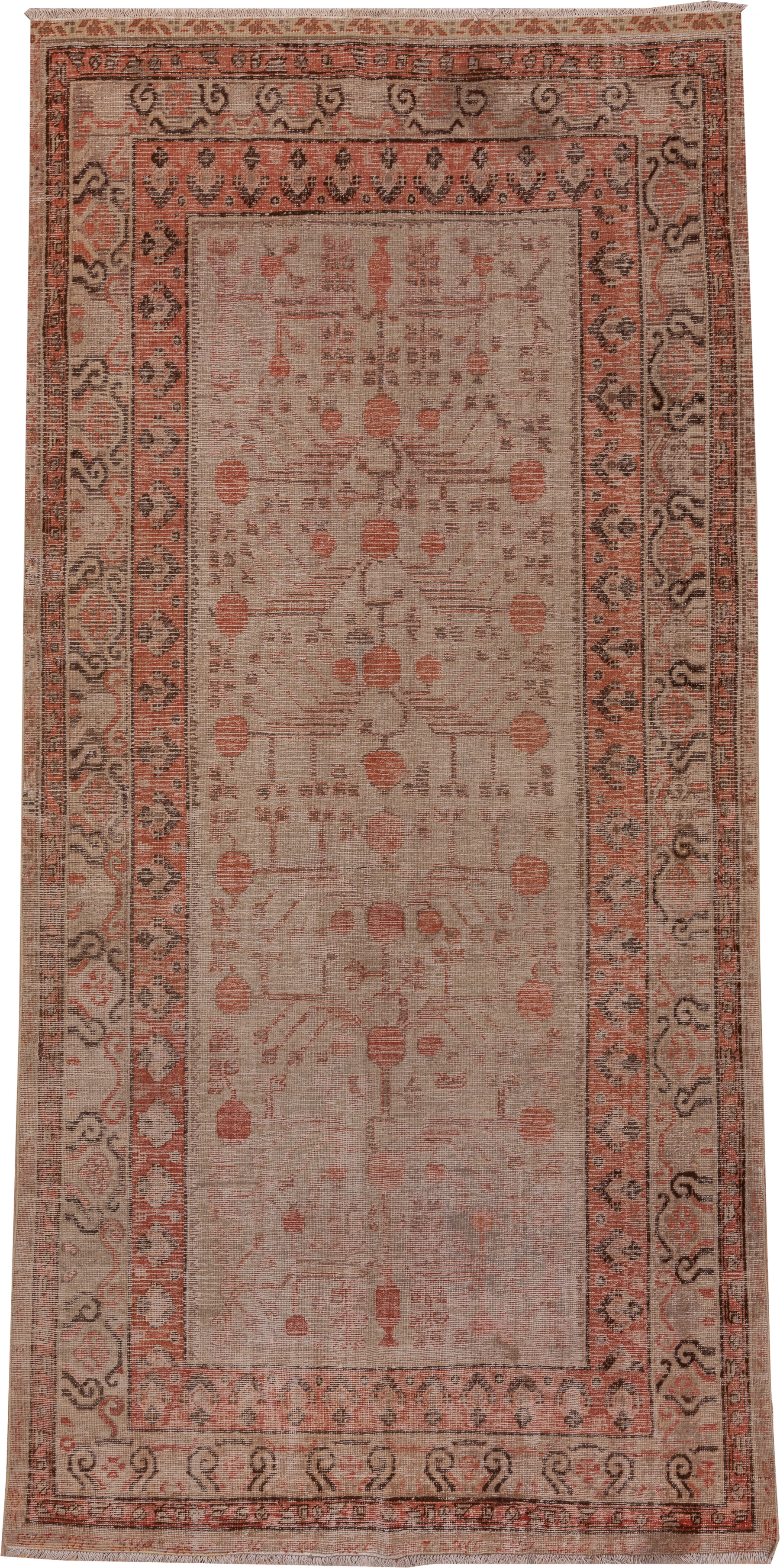 5' x 11' one-of-a-kind handmade antique Khotan rug. Color palette: ivory, terra cotta, taupe, charcoal, rose, camel