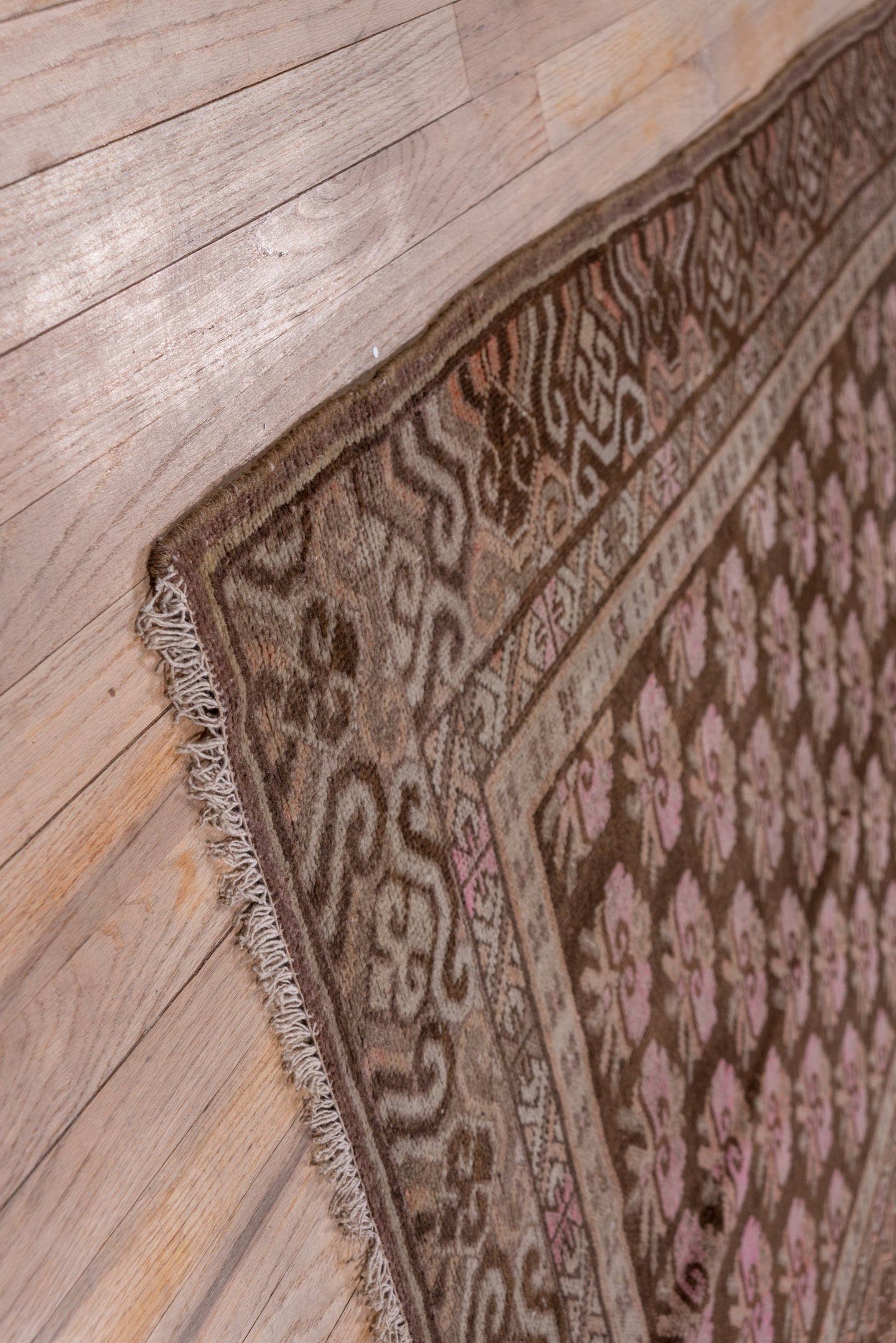4' x 9' one-of-a-kind handmade vintage Khotan rug. Color palette: brown, rose, taupe, ivory, dusty pink, charcoal, camel