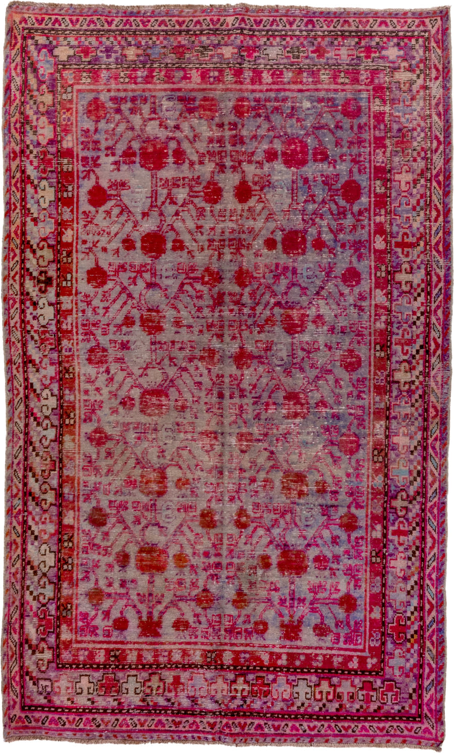 5' x 9' one-of-a-kind handmade antique Khotan medium size rug. Color palette: pink, rose, crimson, ivory, lavender, burgundy