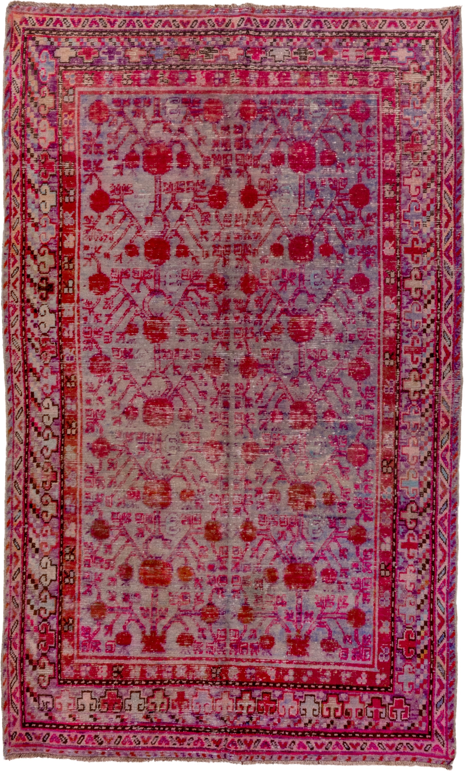 5' x 9' one-of-a-kind handmade antique Khotan medium size rug. Color palette: pink, rose, crimson, ivory, lavender, burgundy