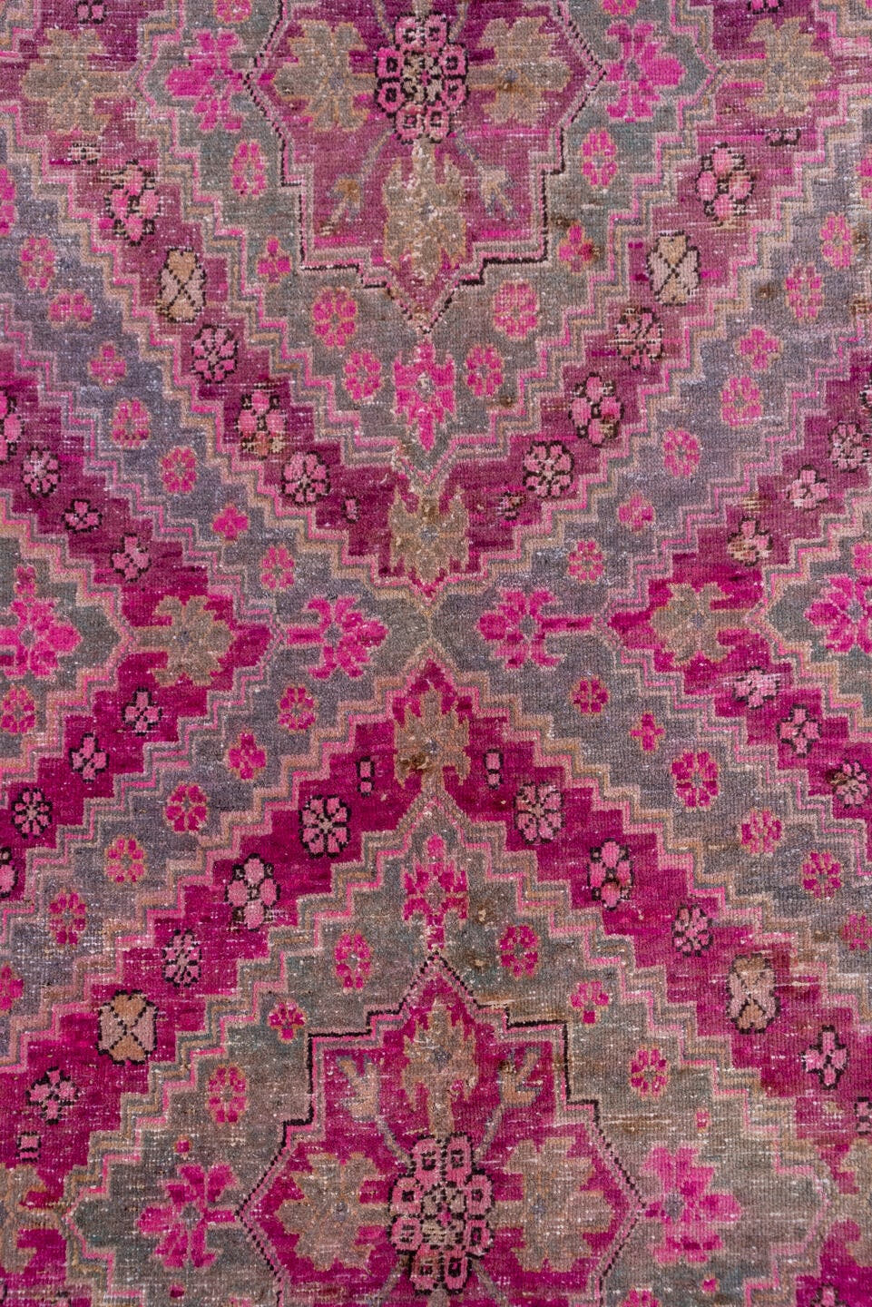 4' x 8' one-of-a-kind handmade antique Khotan rug. Color palette: gray, rose, magenta, taupe, mauve, charcoal, ivory, pink