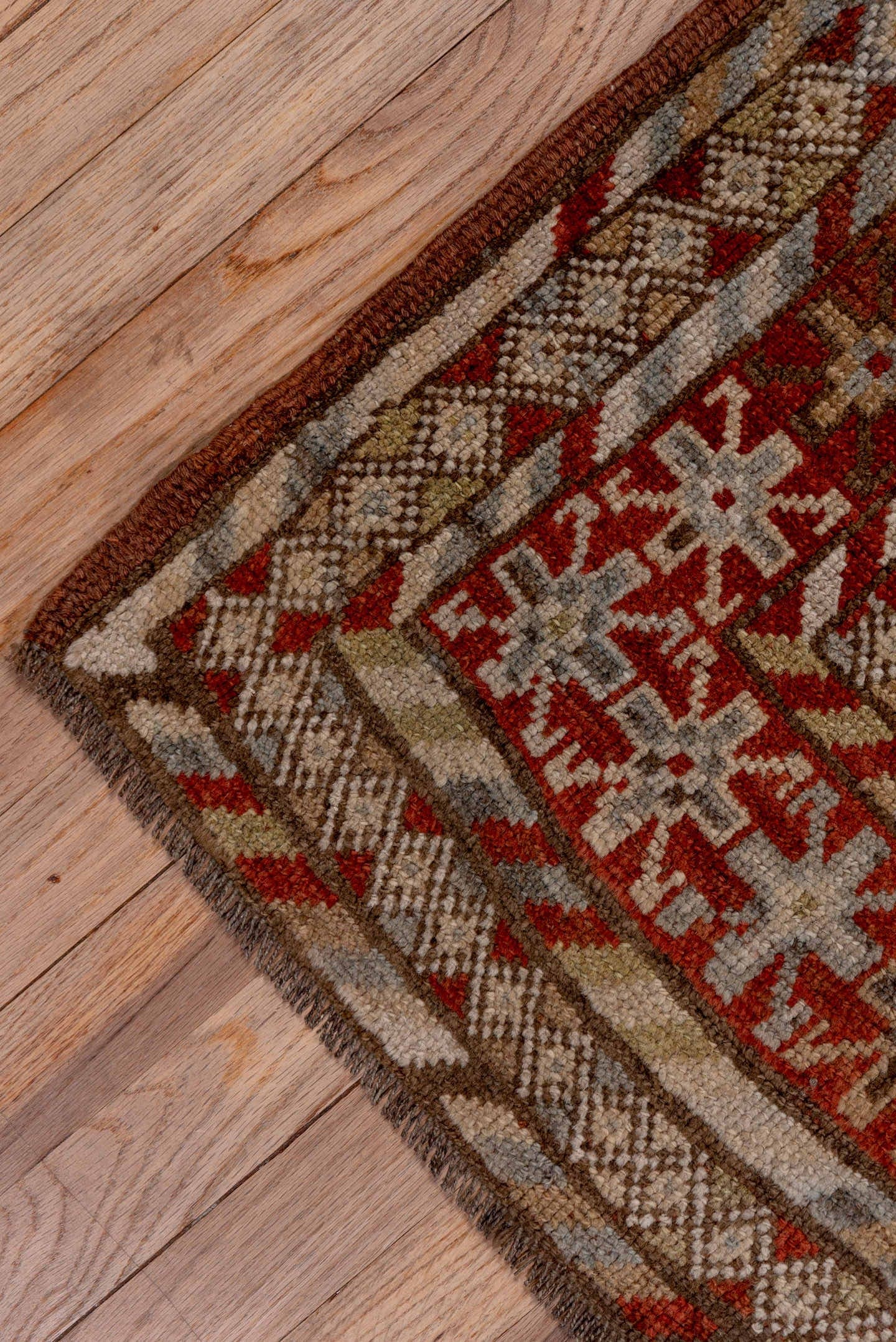 5' x 9' one-of-a-kind handmade antique NW Persian medium size rug. Color palette: taupe, rust, ivory, slate, brown, camel