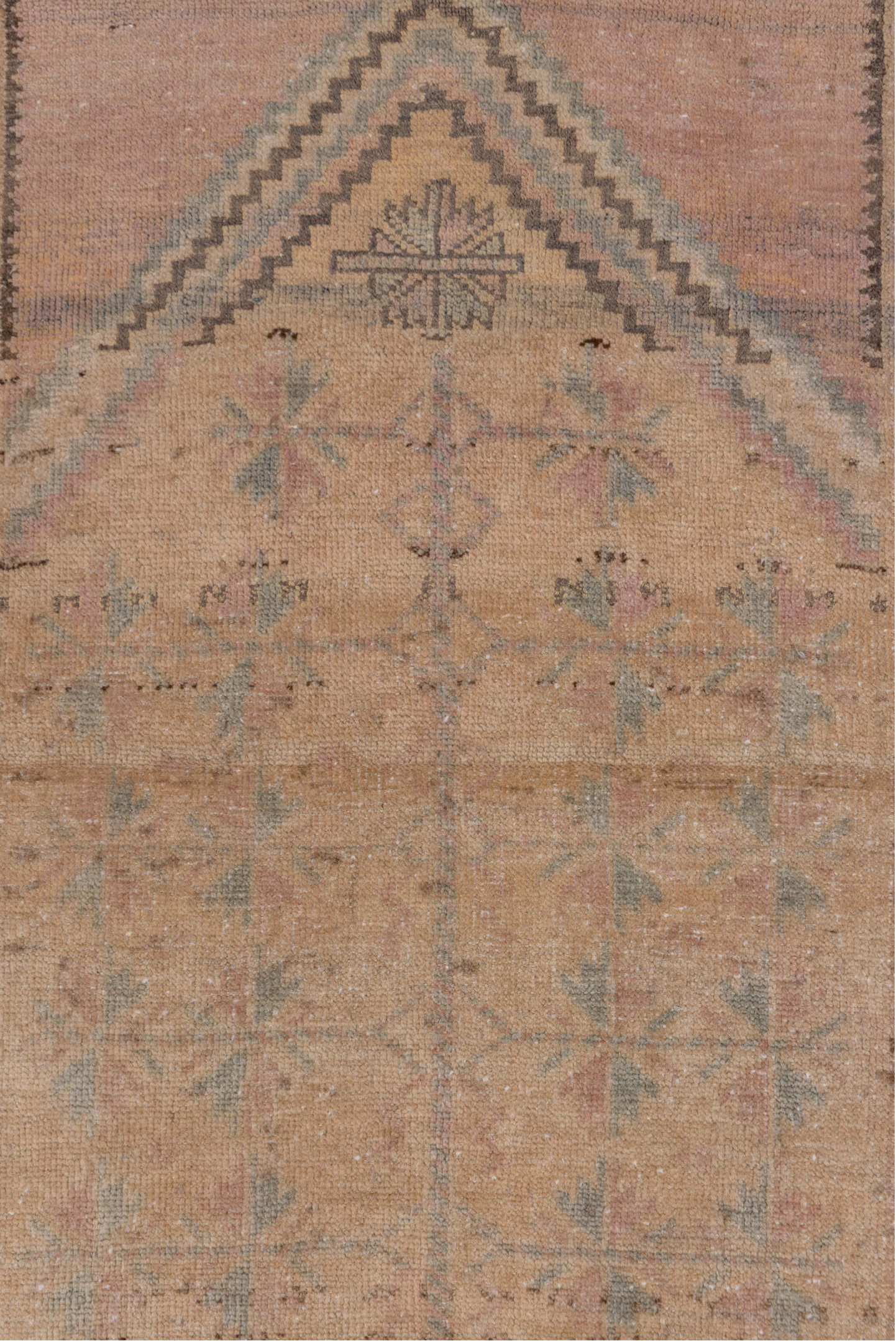 2' x 4' one-of-a-kind handmade vintage Anatolian small size rug. Color palette: brown, gray, light gray, off-white, pink
