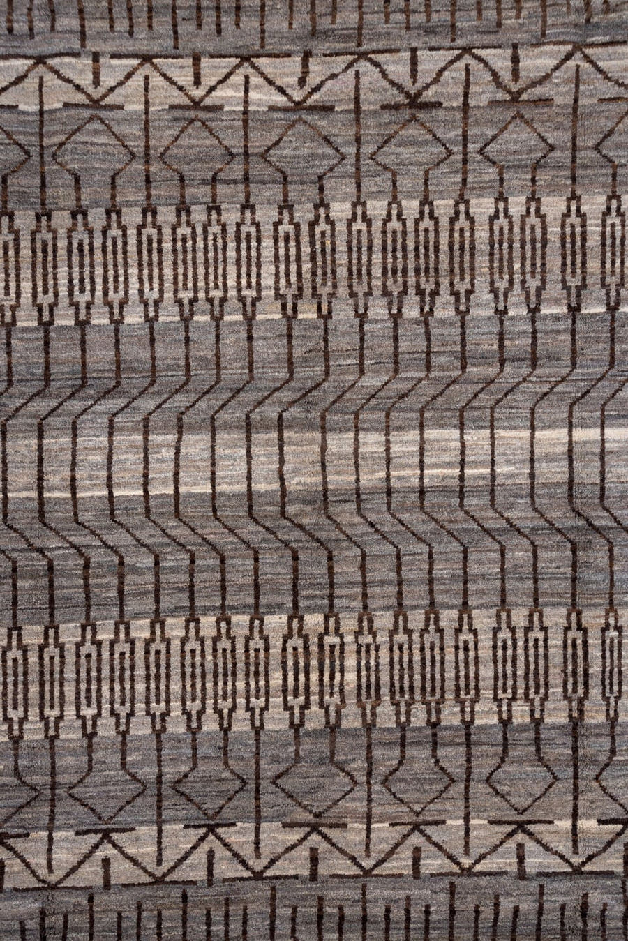 6' x 9' one-of-a-kind handmade vintage Gabbe medium size rug. Color palette: taupe, charcoal, ivory, brown, gray, beige