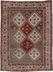 7' x 10' one-of-a-kind handmade antique Shiraz large size rug. Color palette: rust, ivory, taupe, brown, terracotta, camel