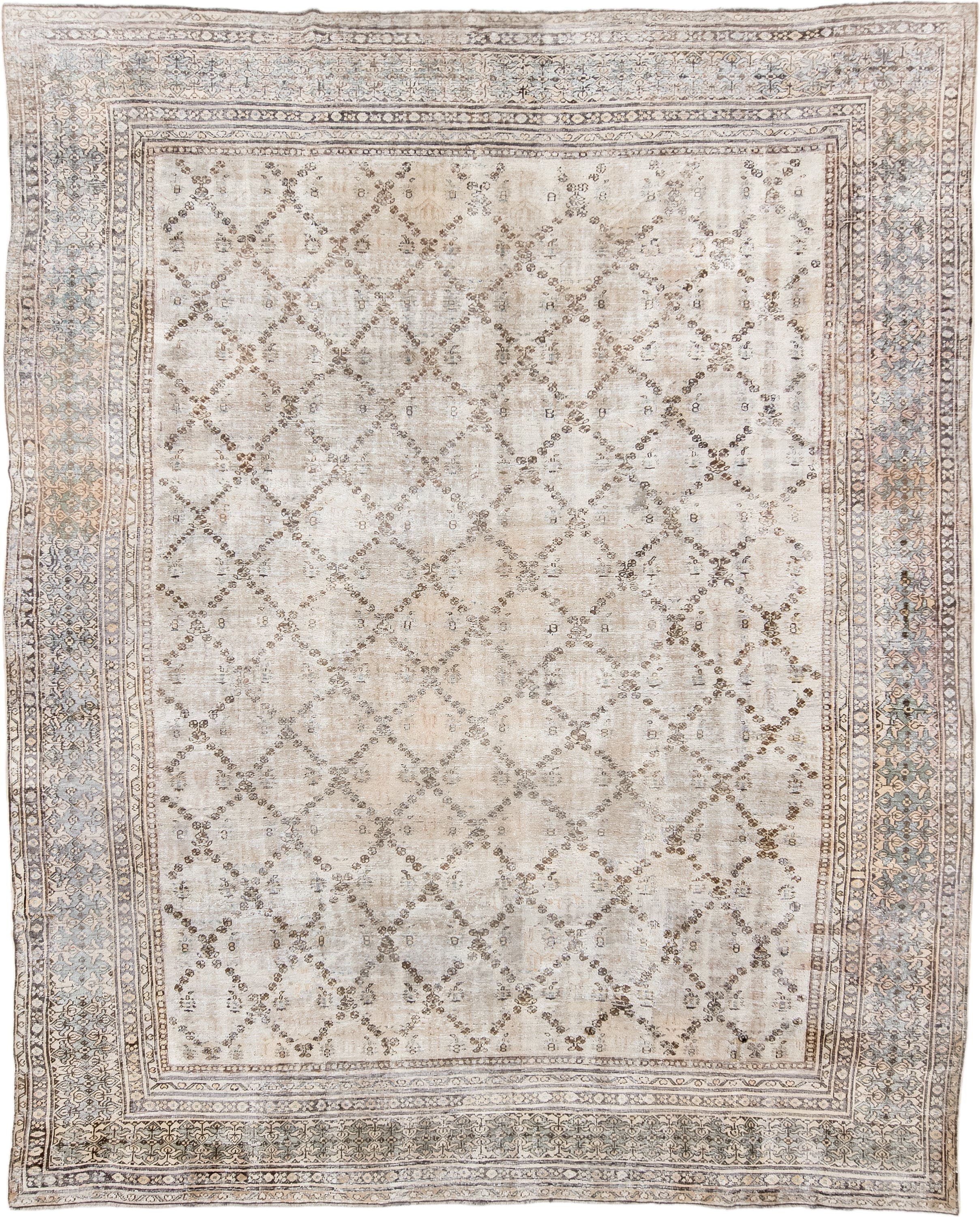 11' x 14' one-of-a-kind handmade vintage Sultanabad oversize rug. Color palette: ivory, taupe, pale blue, beige, brown, gray