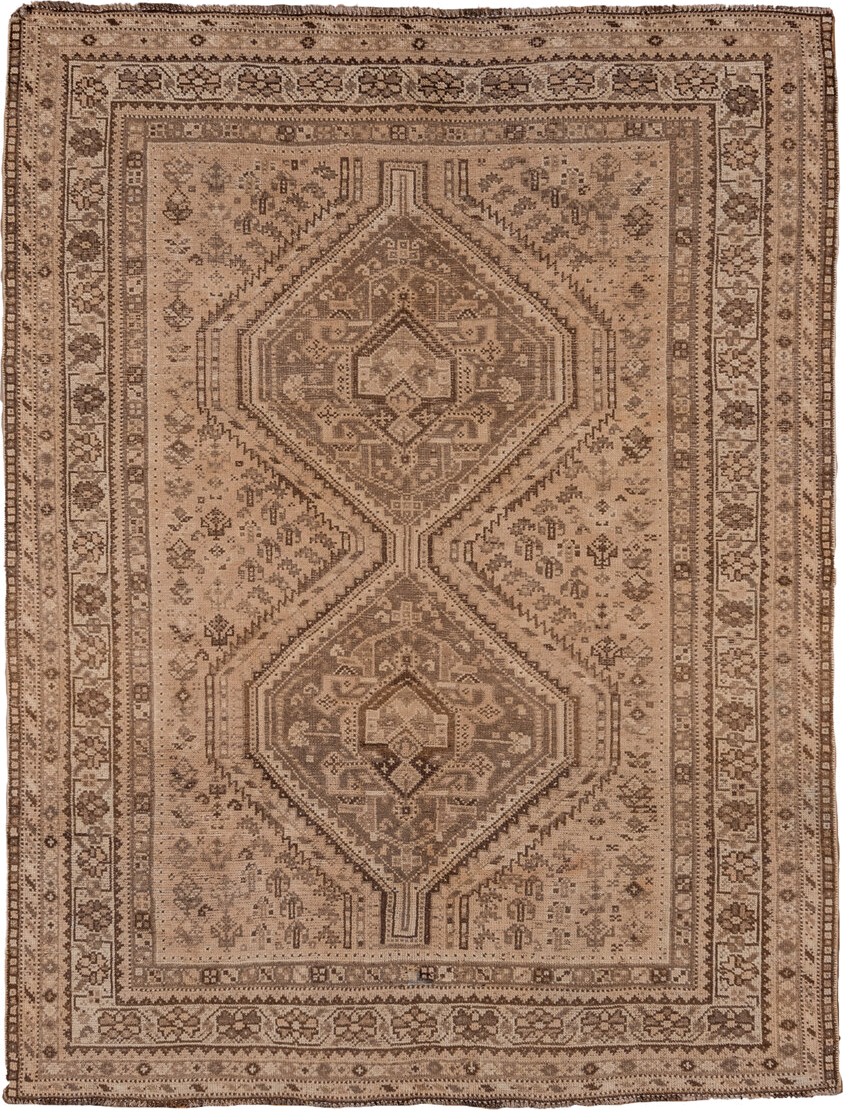 5' x 6' one-of-a-kind handmade antique Shiraz rug. Color palette: camel, taupe, brown, beige, ivory, gray