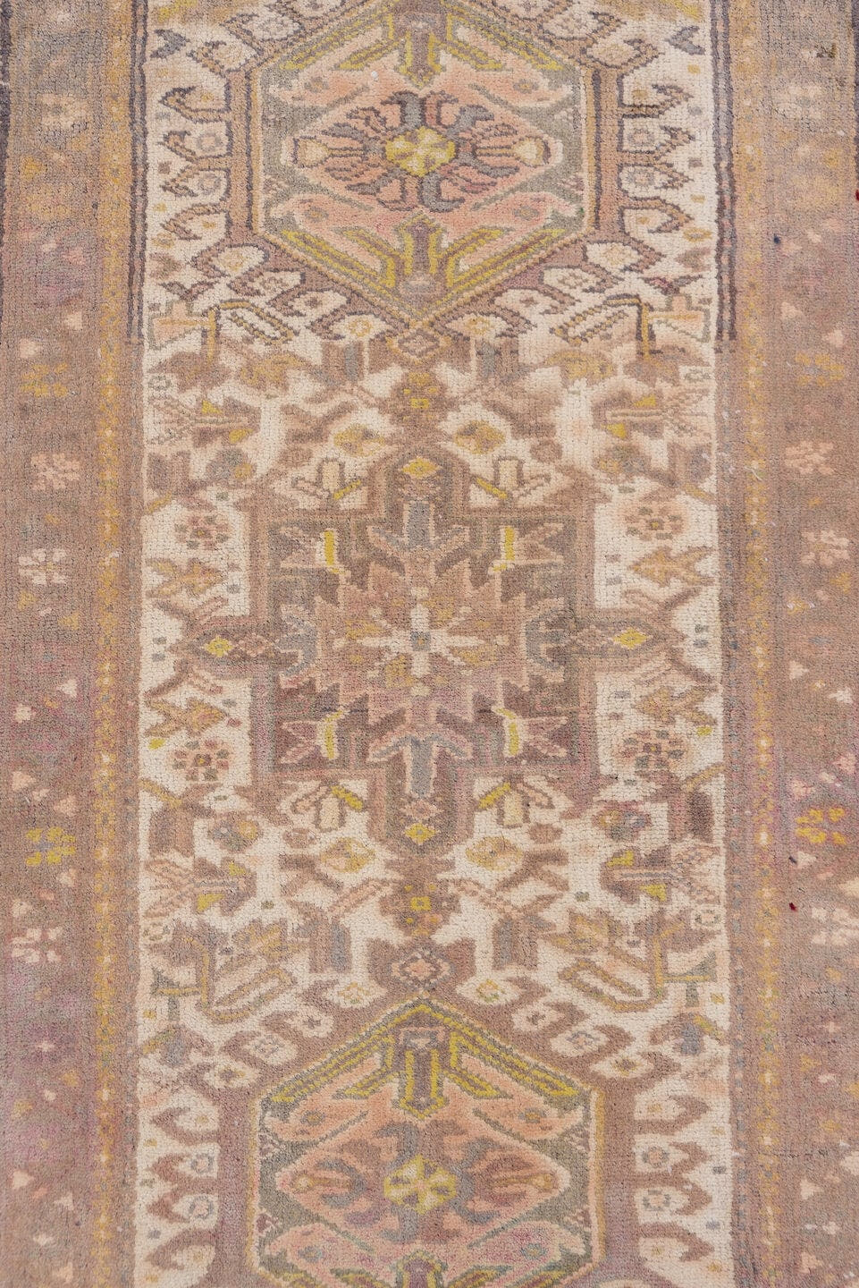2' x 10' one-of-a-kind handmade antique Karaje runner rug. Color palette: taupe, ivory, camel, gold, sage, brown, beige