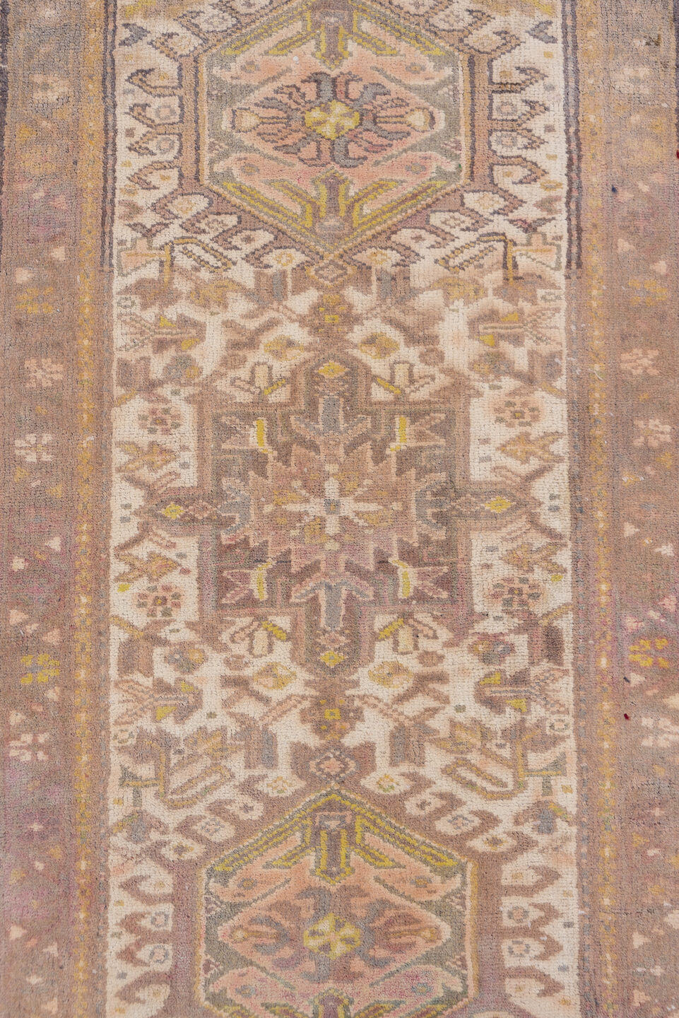 2' x 10' one-of-a-kind handmade antique Karaje runner rug. Color palette: taupe, ivory, camel, gold, sage, brown, beige