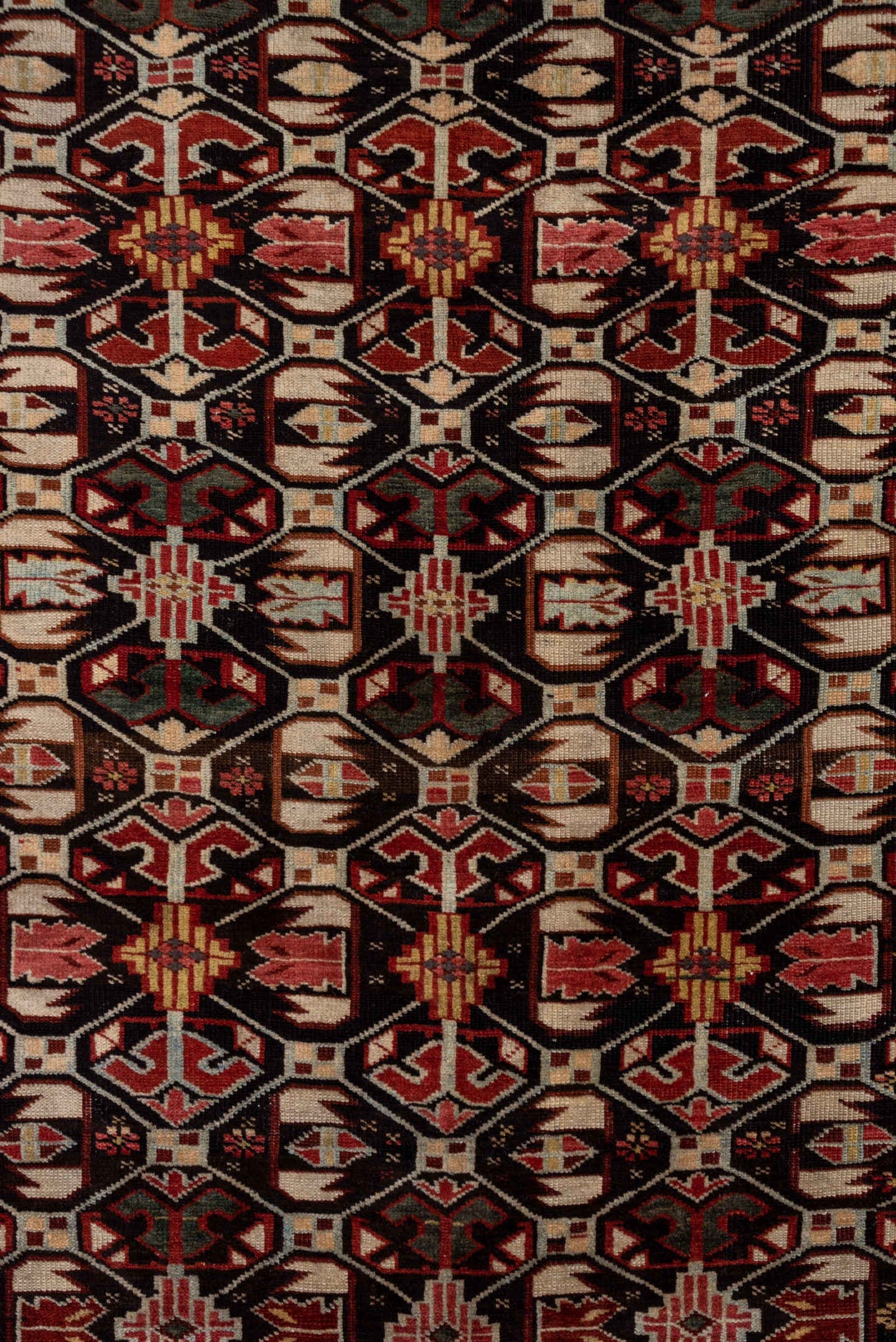 4' x 7' one-of-a-kind handmade antique Kuba rug. Color palette: burgundy, ivory, charcoal, rust, crimson, gold, taupe, gray
