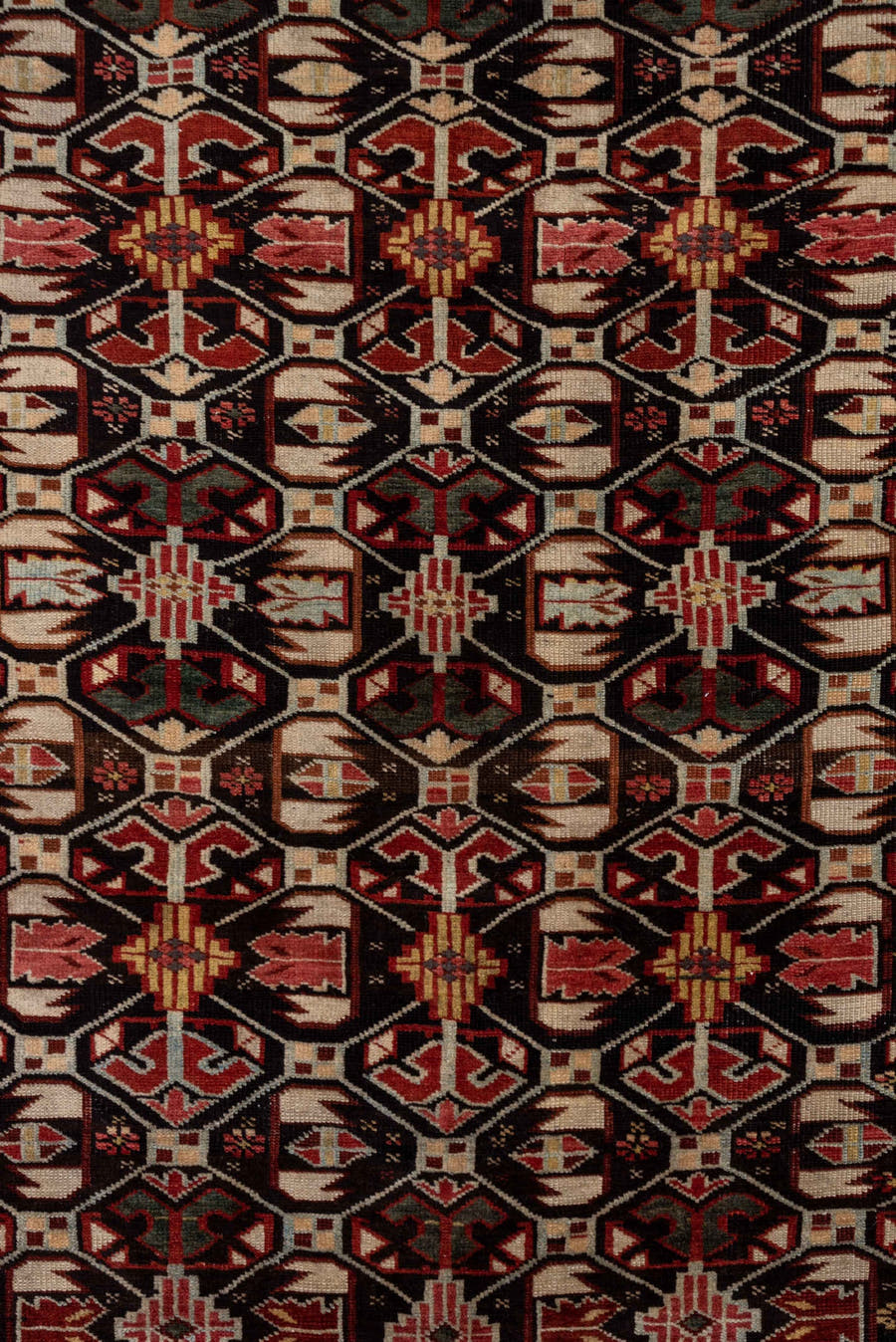 4' x 7' one-of-a-kind handmade antique Kuba rug. Color palette: burgundy, ivory, charcoal, rust, crimson, gold, taupe, gray