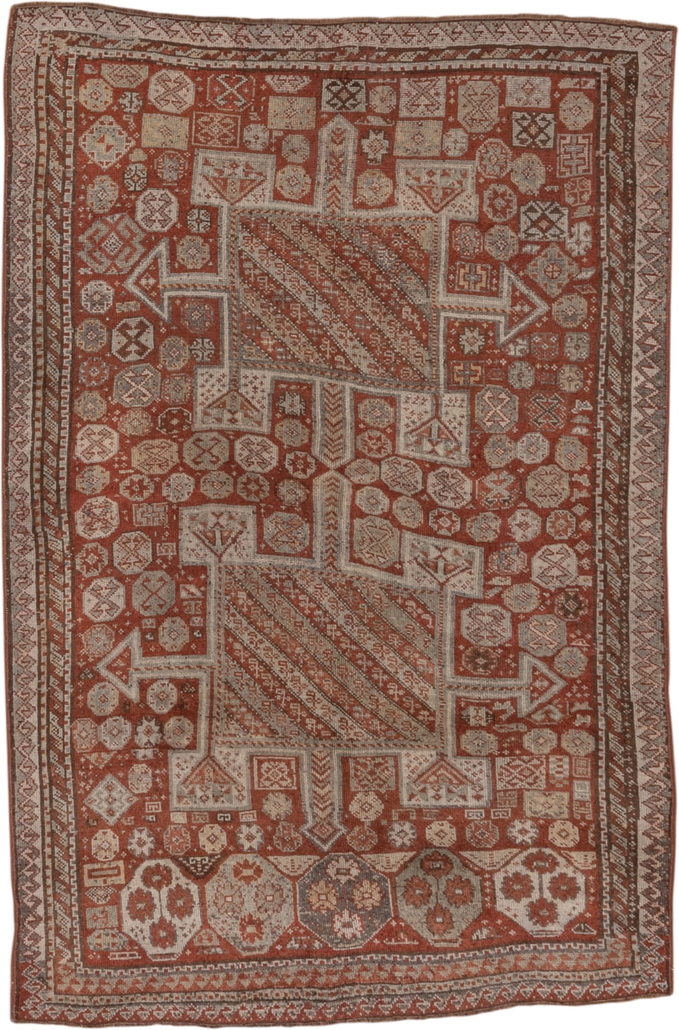4' x 7' one-of-a-kind handmade antique Kurd rug. Color palette: rust, ivory, terra cotta, brown, taupe, charcoal, terracotta