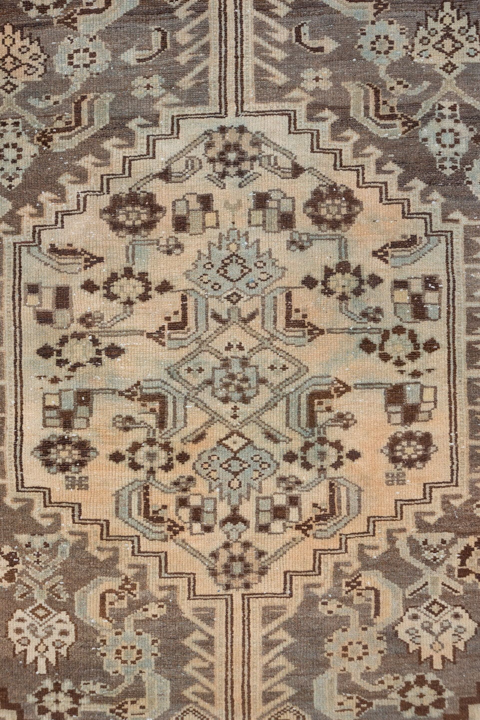 4' x 6' one-of-a-kind handmade antique Shiraz small size rug. Color palette: ivory, taupe, brown, pale blue, camel, charcoal