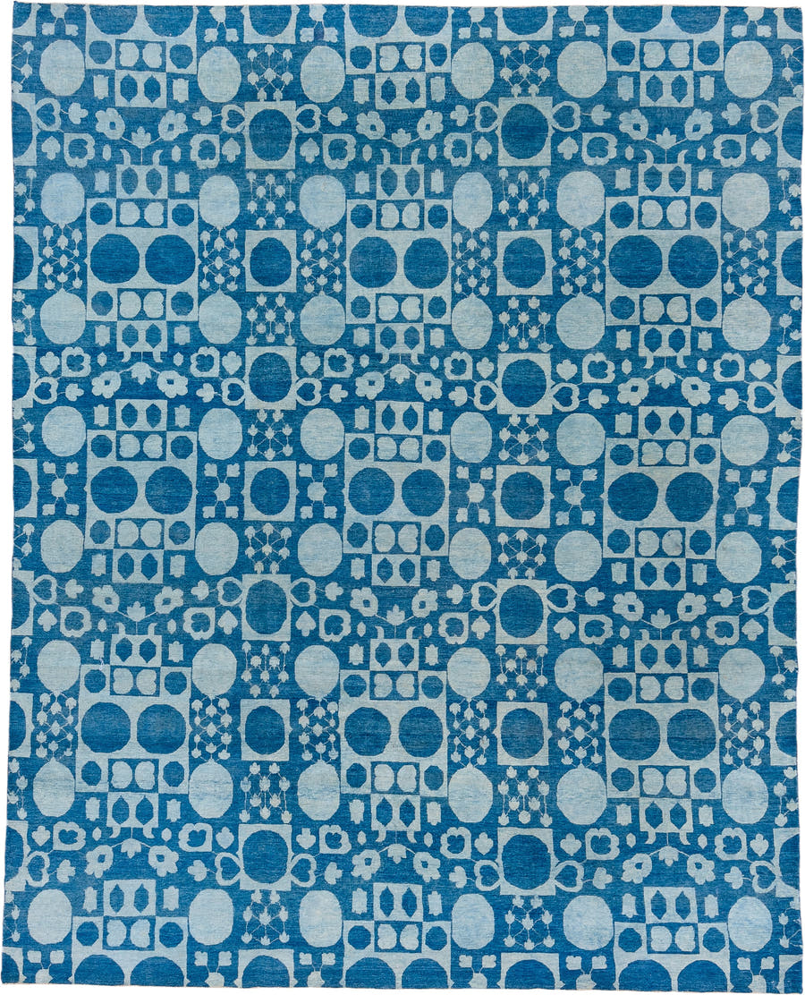 8' x 9' one-of-a-kind handmade handmade Modern rug. Color palette: blue, ivory, sky blue, light blue