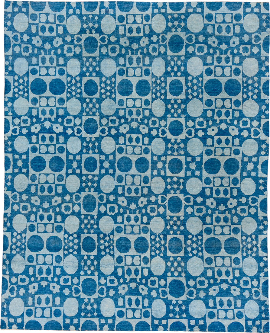 8' x 9' one-of-a-kind handmade handmade Modern rug. Color palette: blue, ivory, sky blue, light blue