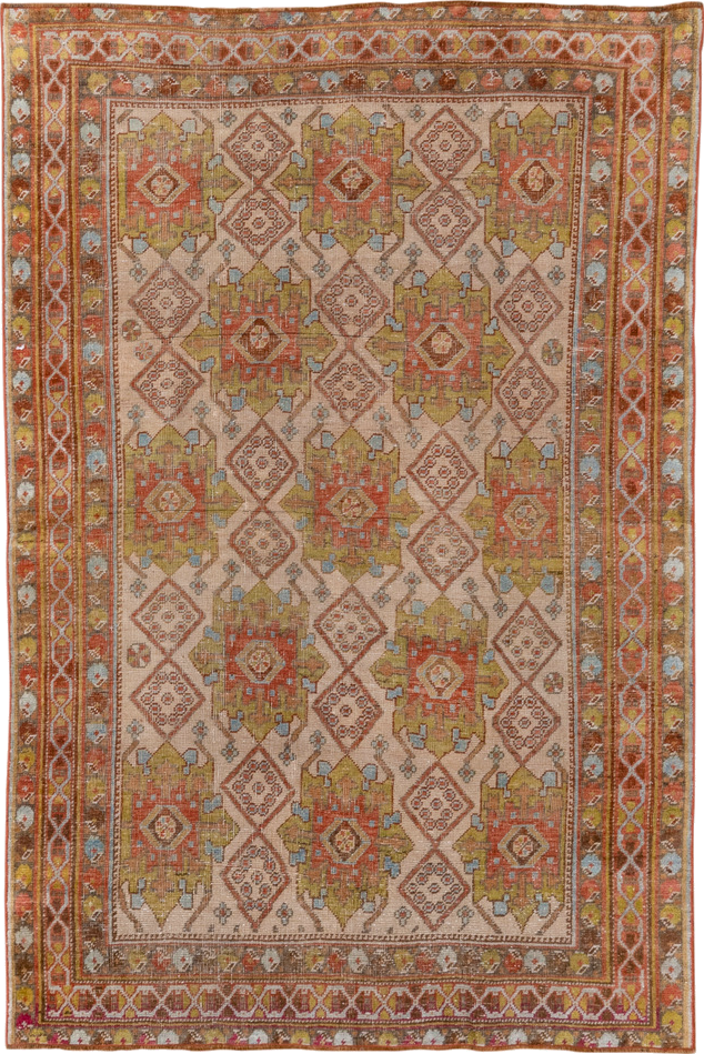 4' x 5' one-of-a-kind handmade vintage Afshar small size rug. Color palette: brown, gray, light gray, off-white, orange