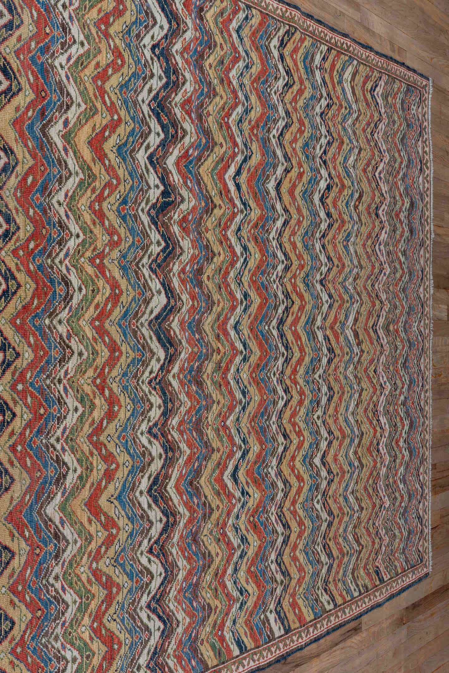 5' x 9' one-of-a-kind handmade vintage NW Persian medium size rug. Color palette: ivory, rust, brown, indigo, camel, olive