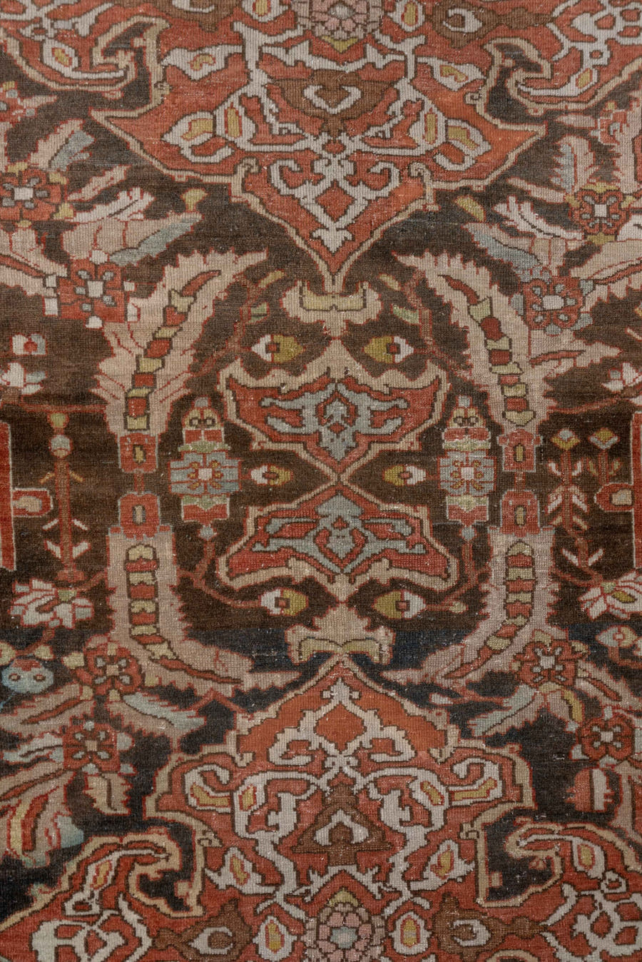 4' x 6' one-of-a-kind handmade antique Baktiary small size rug. Color palette: brown, rust, ivory, slate, camel, terra cotta