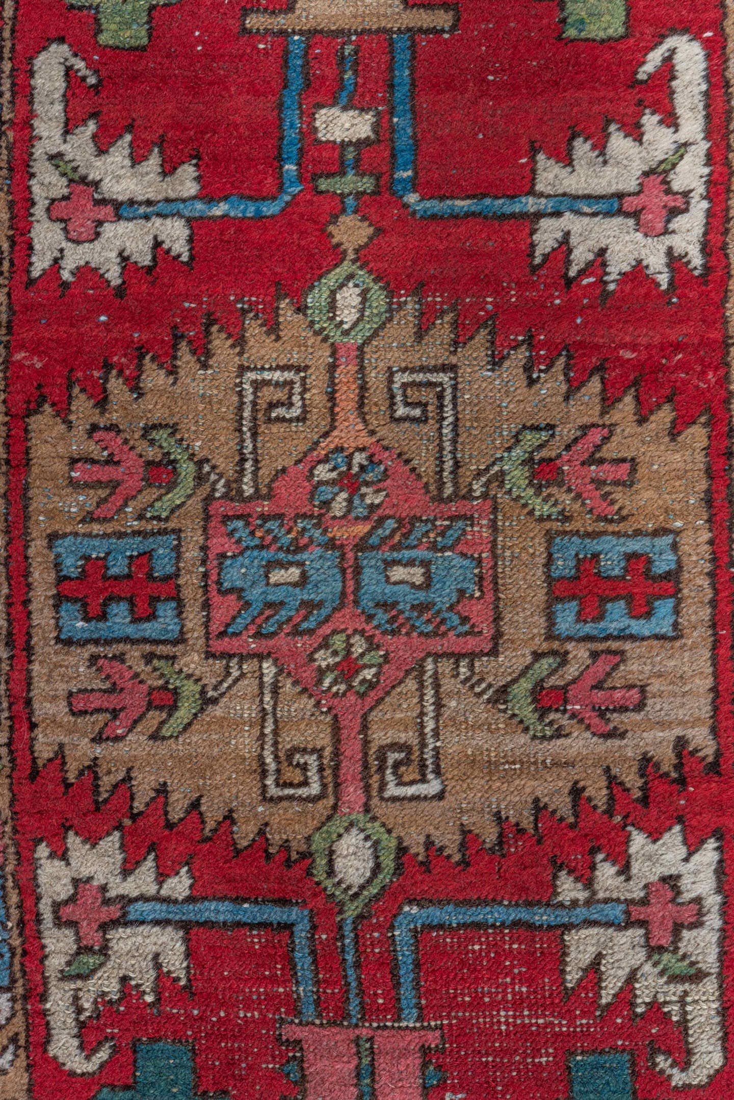 3' x 7' one-of-a-kind handmade vintage Heriz runner rug. Color palette: red, navy, camel, ivory, sky_blue, rose, olive, blue