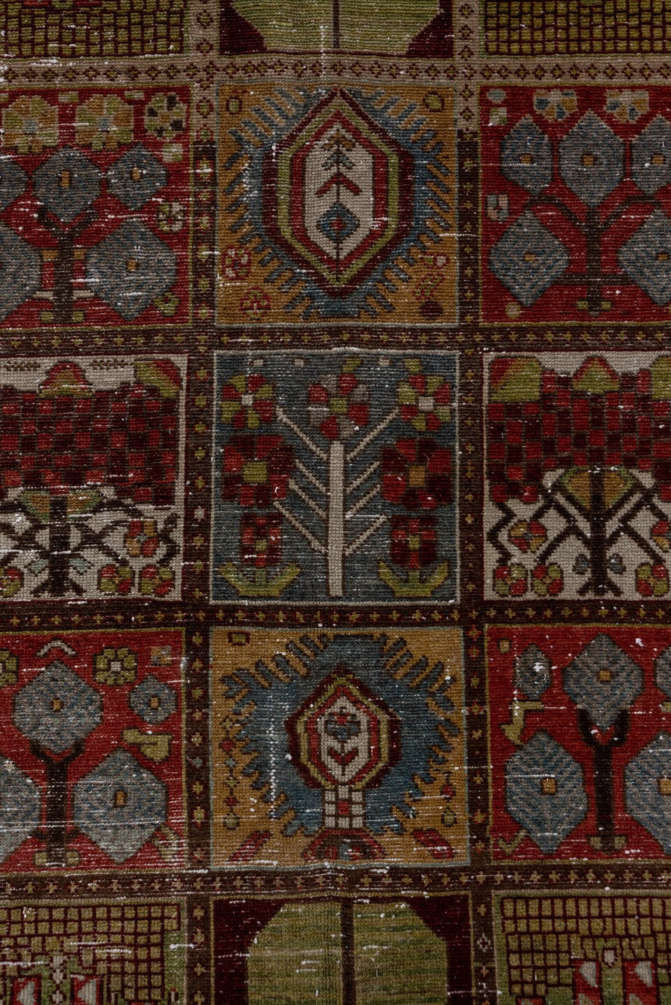 6' x 10' one-of-a-kind handmade antique Baktiary large size rug. Color palette: ivory, rust, olive, burgundy, blue, taupe