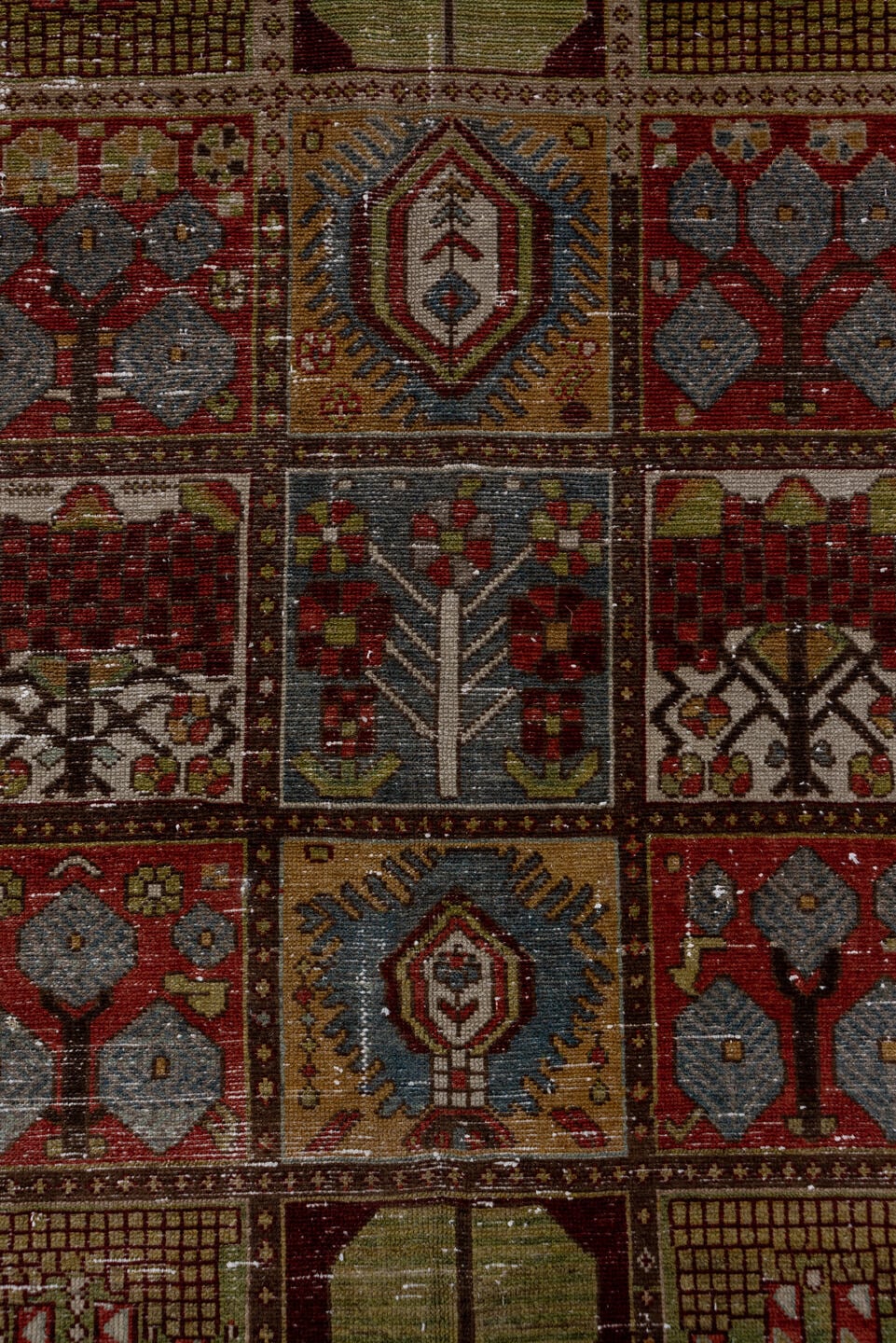6' x 10' one-of-a-kind handmade antique Baktiary large size rug. Color palette: ivory, rust, olive, burgundy, blue, taupe