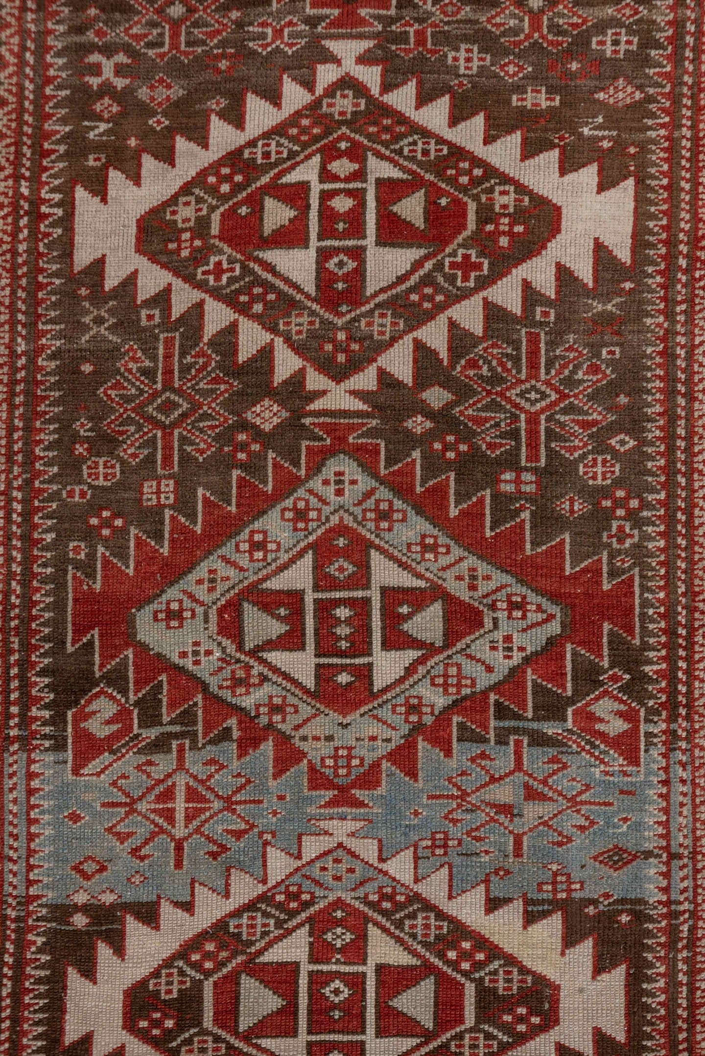 2' x 6' one-of-a-kind handmade antique Shirvan runner rug. Color palette: brown, rust, ivory, pale blue, taupe, brick, camel