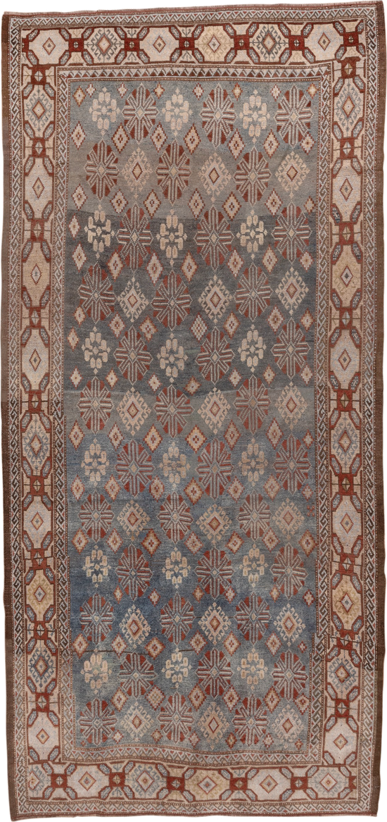 4' x 9' one-of-a-kind handmade vintage Caucasian runner rug. Color palette: brown, gray, pink