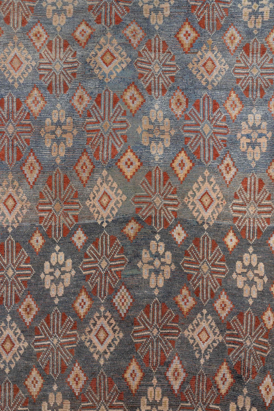 4' x 9' one-of-a-kind handmade antique Caucasian runner rug. Color palette: blue, ivory, rust, taupe, slate, camel