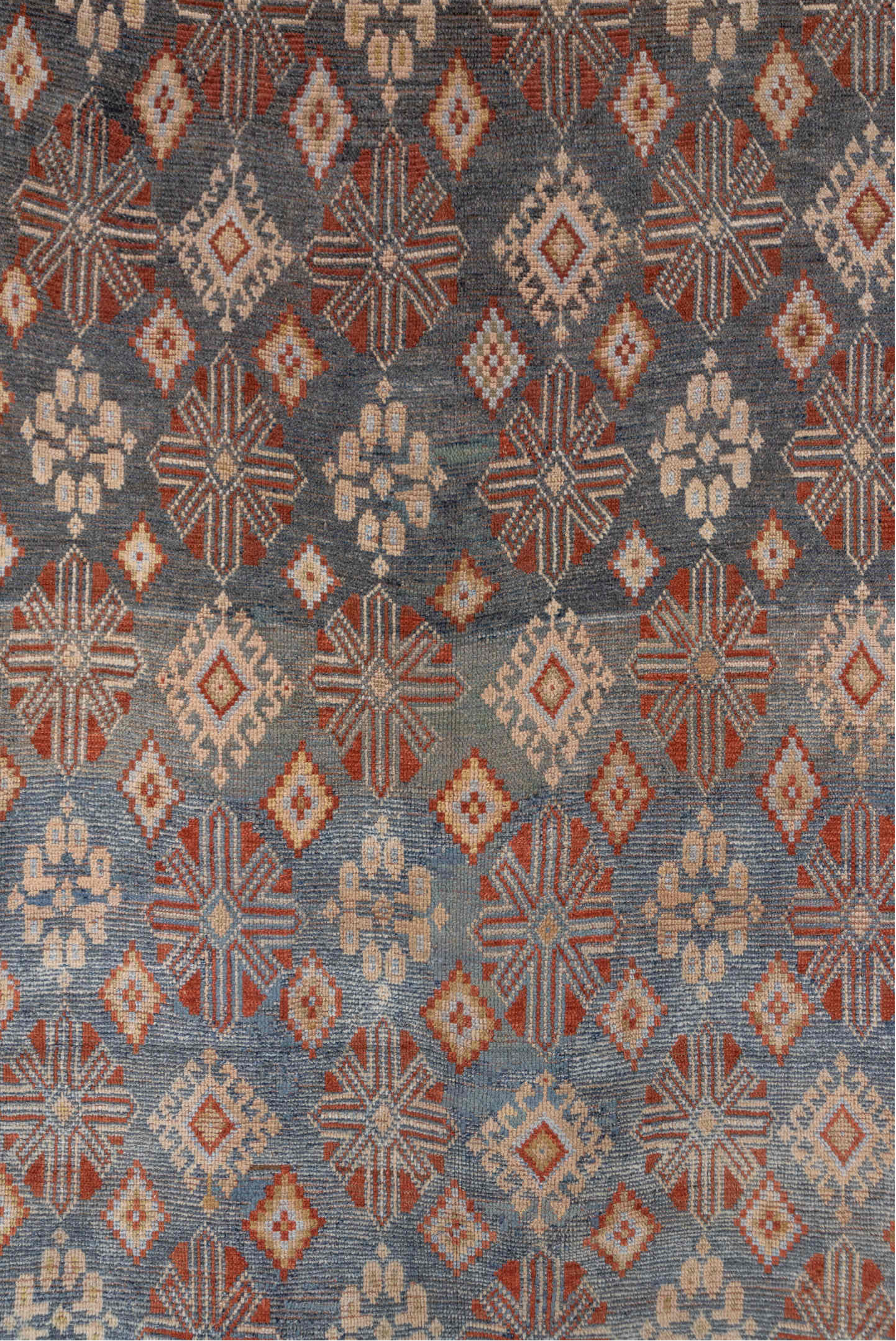 4' x 9' one-of-a-kind handmade vintage Caucasian runner rug. Color palette: brown, gray, pink