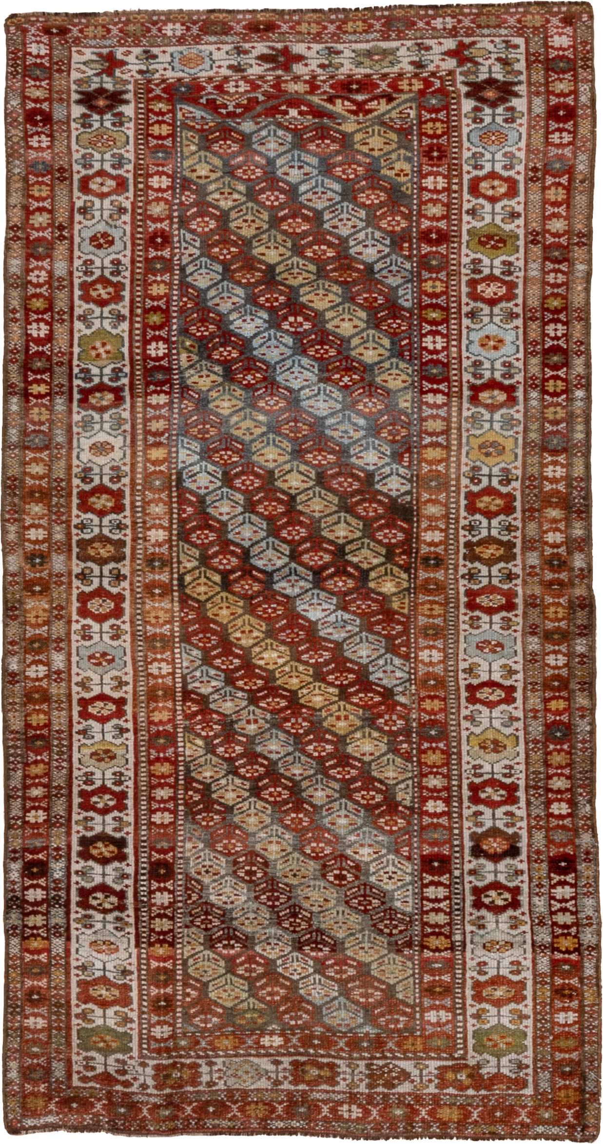 3' x 7' one-of-a-kind handmade antique Kurd rug. Color palette: rust, ivory, sky blue, camel, olive, brown, brick, slate