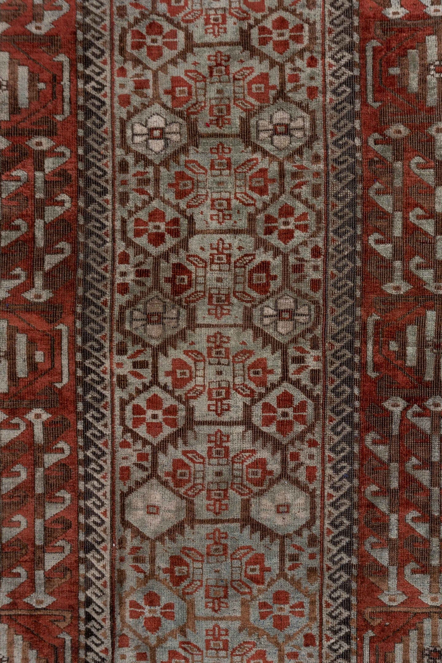 2' x 5' one-of-a-kind handmade antique Belouch small size rug. Color palette: rust, ivory, brown, camel, charcoal