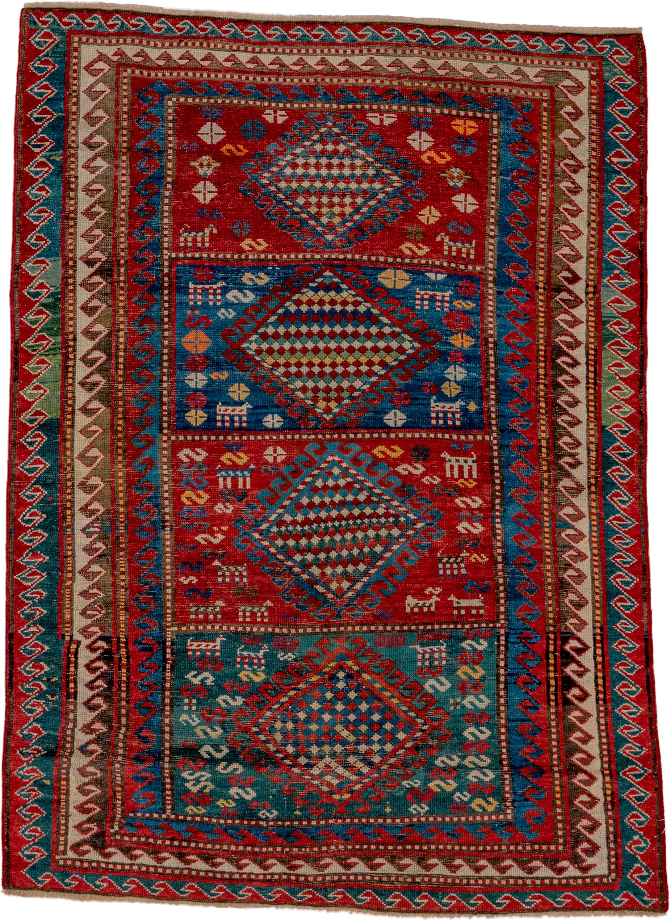 3' x 5' one-of-a-kind handmade antique Caucasian small size rug. Color palette: red, turquoise, ivory, blue, burgundy, camel