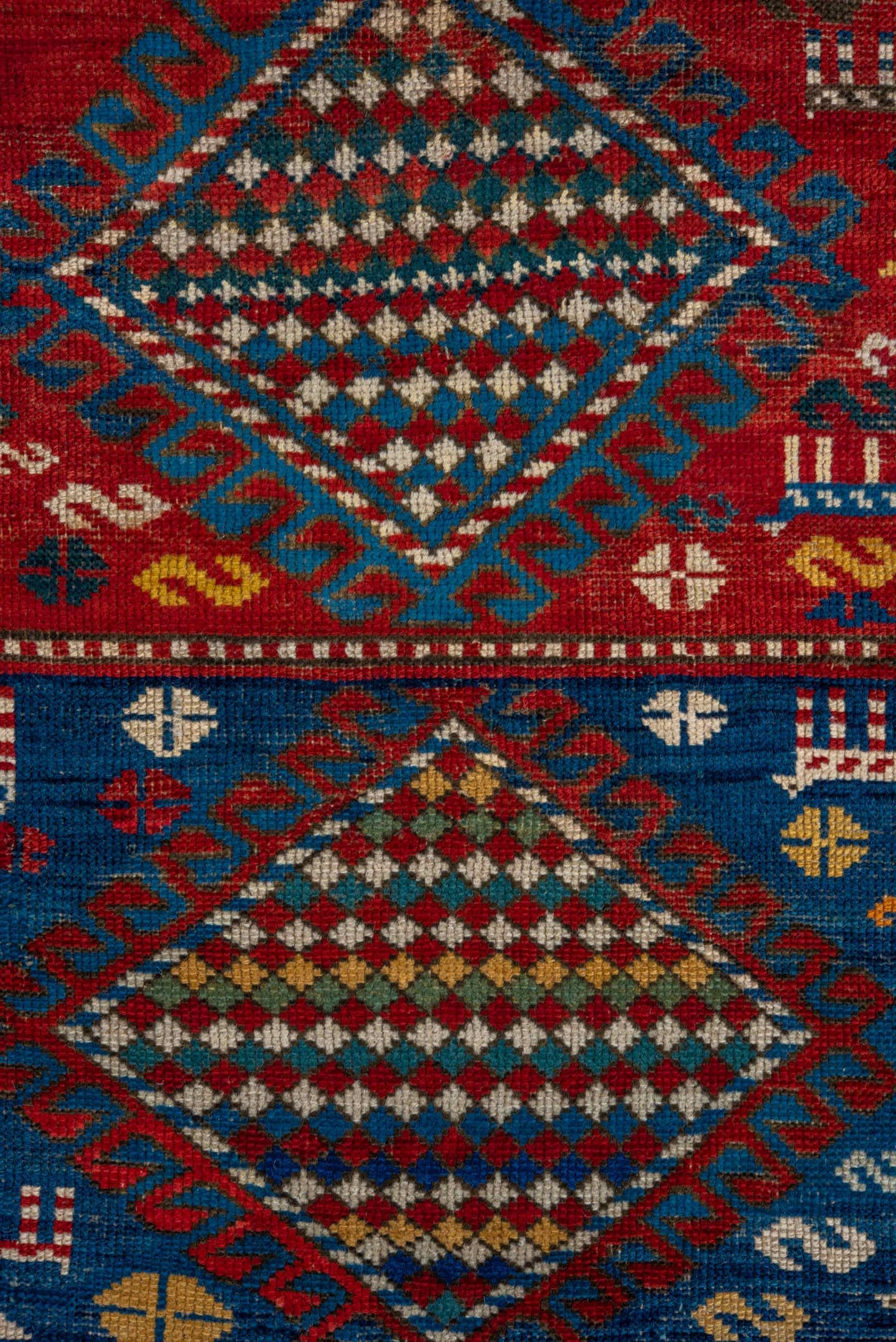3' x 5' one-of-a-kind handmade antique Caucasian small size rug. Color palette: red, turquoise, ivory, blue, burgundy, camel
