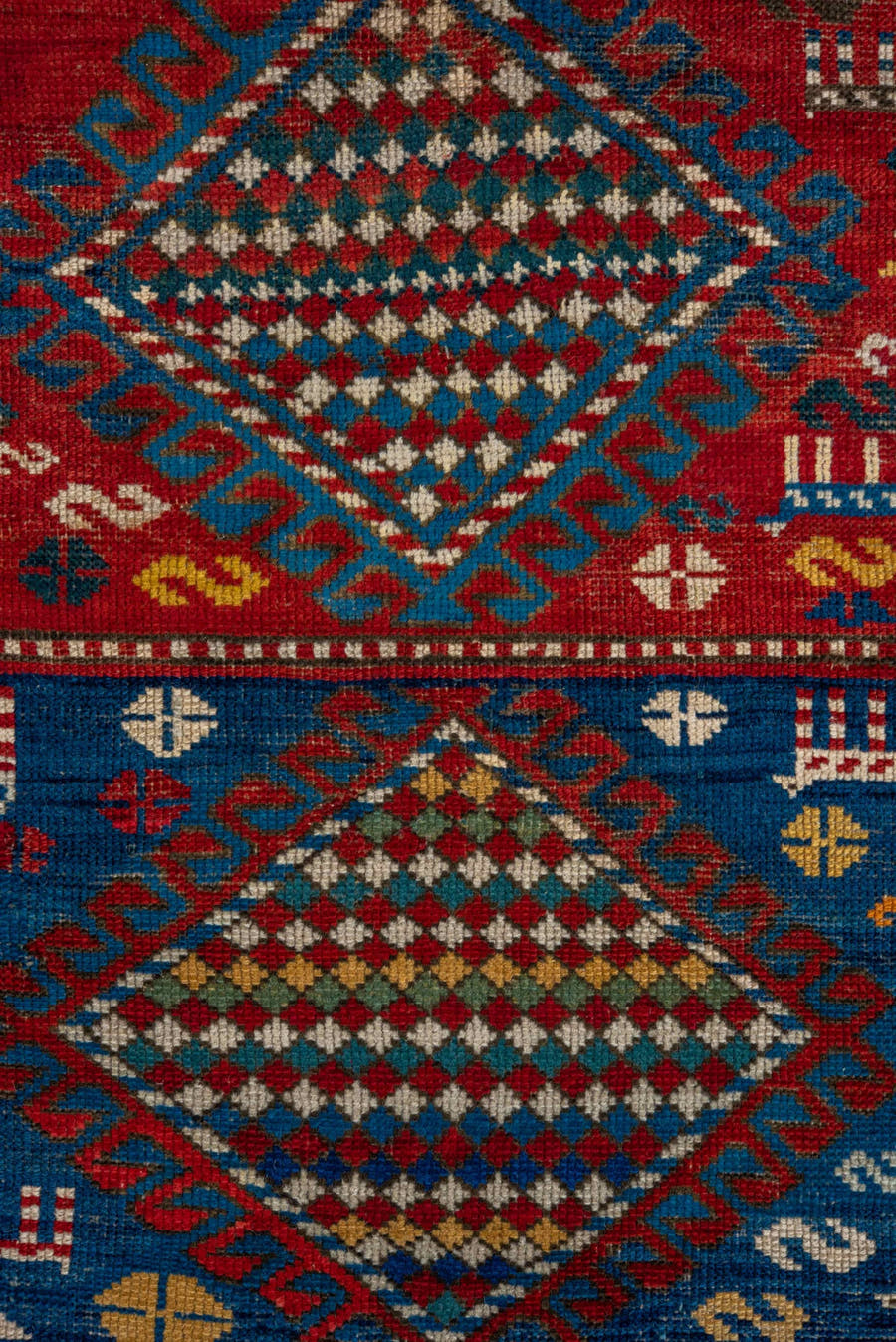3' x 5' one-of-a-kind handmade antique Caucasian small size rug. Color palette: red, turquoise, ivory, blue, burgundy, camel