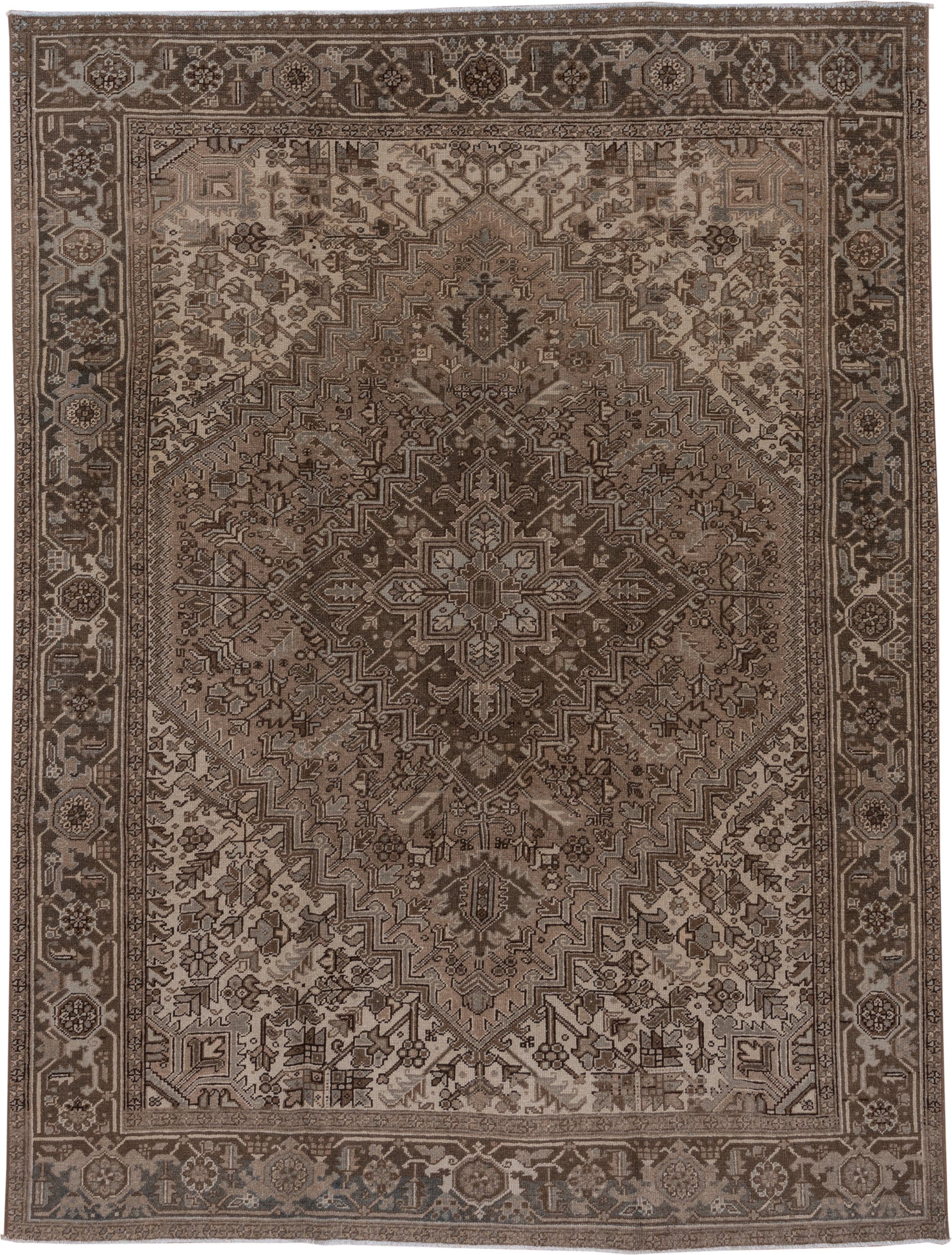 7' x 9' one-of-a-kind handmade vintage Heriz rug. Color palette: taupe, brown, ivory, charcoal, camel, greige, beige, gray