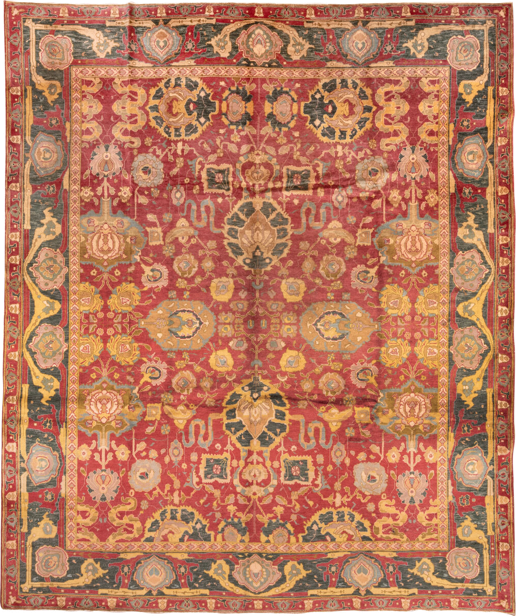 11' x 13' one-of-a-kind handmade vintage Agra oversize rug. Color palette: rust, charcoal, gold, ivory, sage, terra cotta
