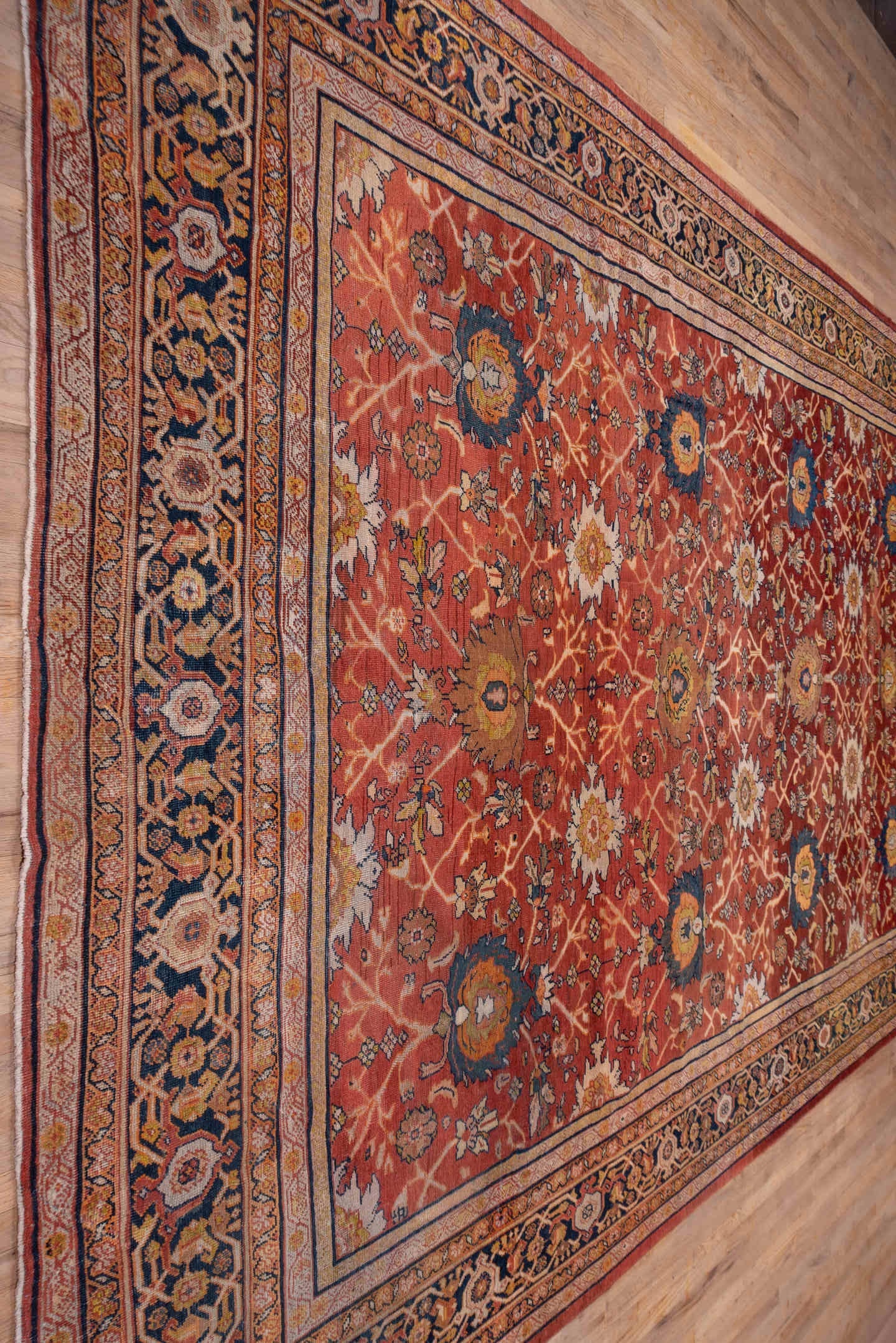 10' x 15' one-of-a-kind handmade antique Mahal rug. Color palette: terra cotta, navy, ivory, rust, gold, camel, sienna