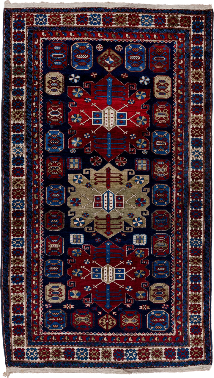 4' x 7' one-of-a-kind handmade antique Caucasian rug. Color palette: navy, crimson, ivory, cobalt, burgundy, camel, saffron