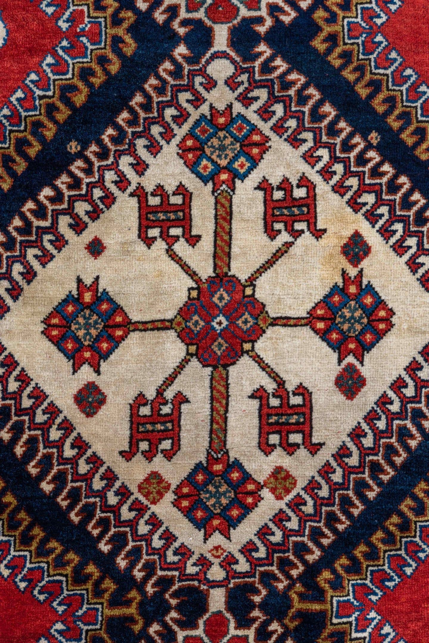 4' x 7' one-of-a-kind handmade vintage Qashqai rug. Color palette: crimson, ivory, indigo, camel, sky_blue, rust, black, red