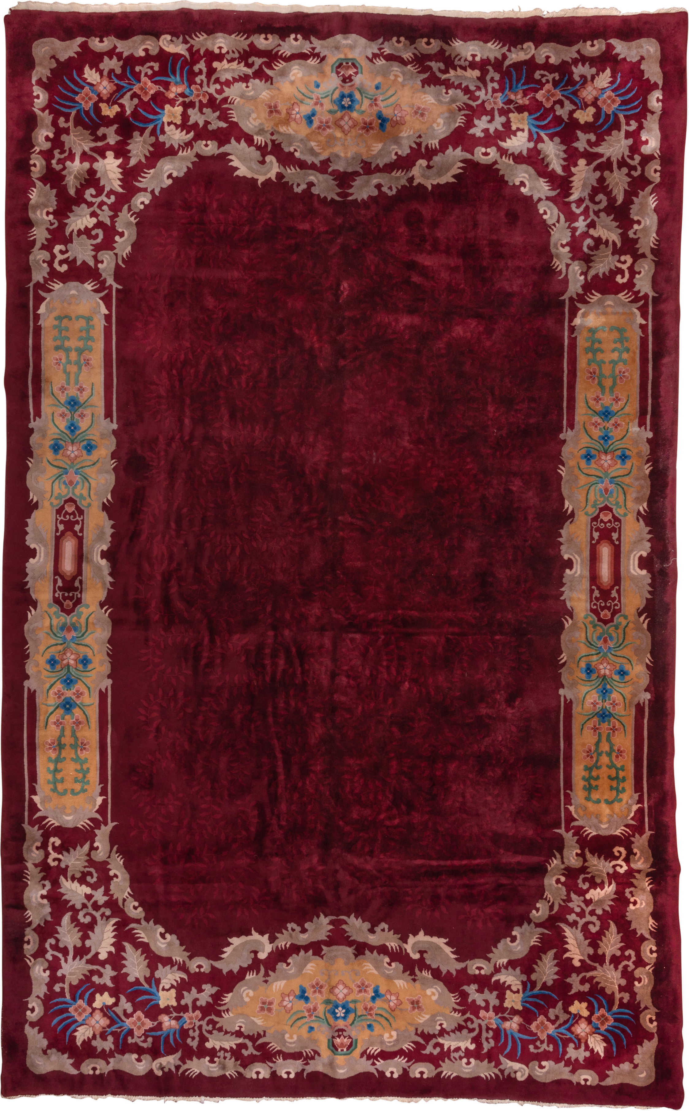 10' x 17' one-of-a-kind handmade antique Chinese rug. Color palette: burgundy, gold, ivory, blue, rose, taupe, pink, red